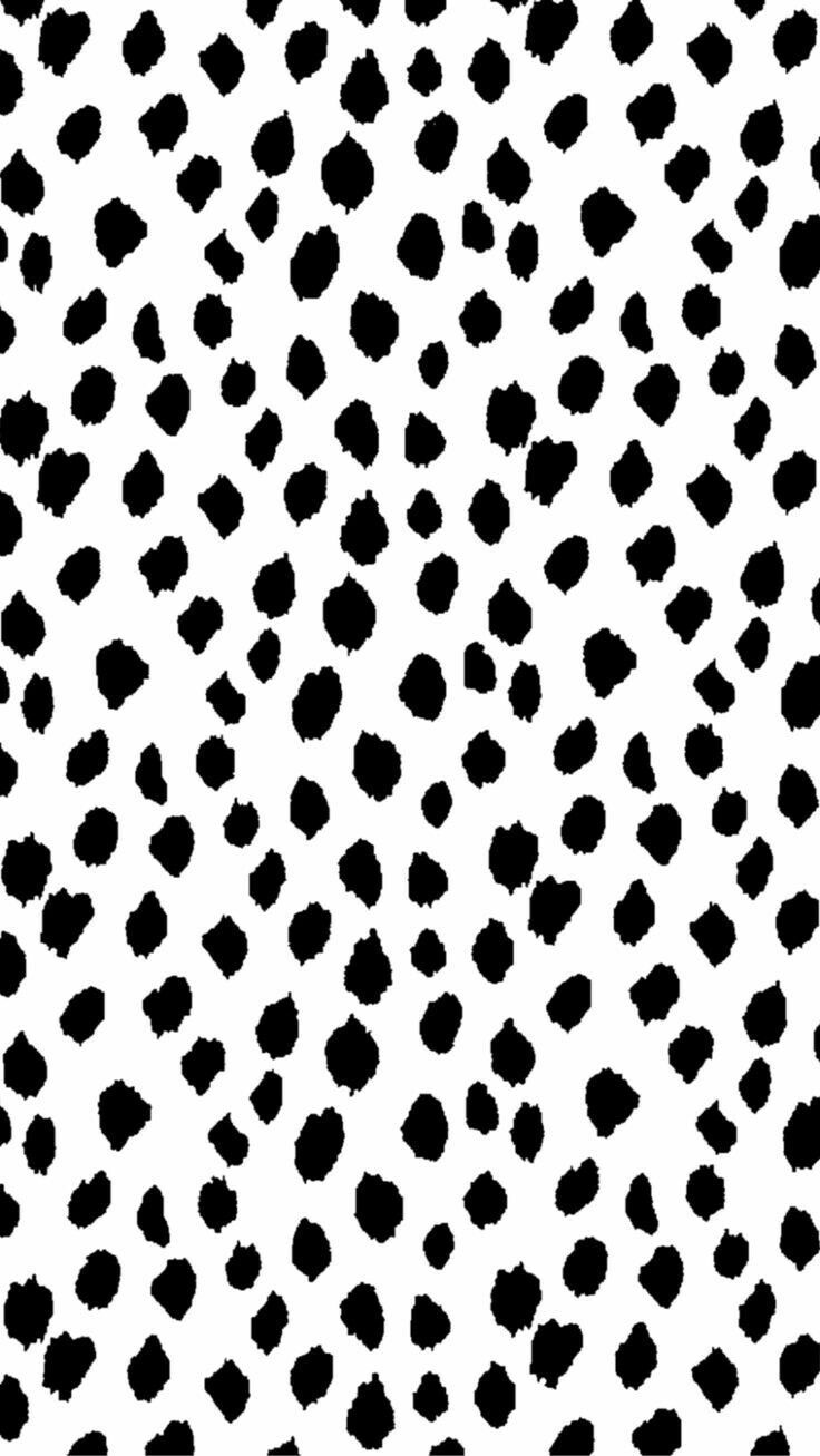 A black and white pattern of irregular dots - VSCO