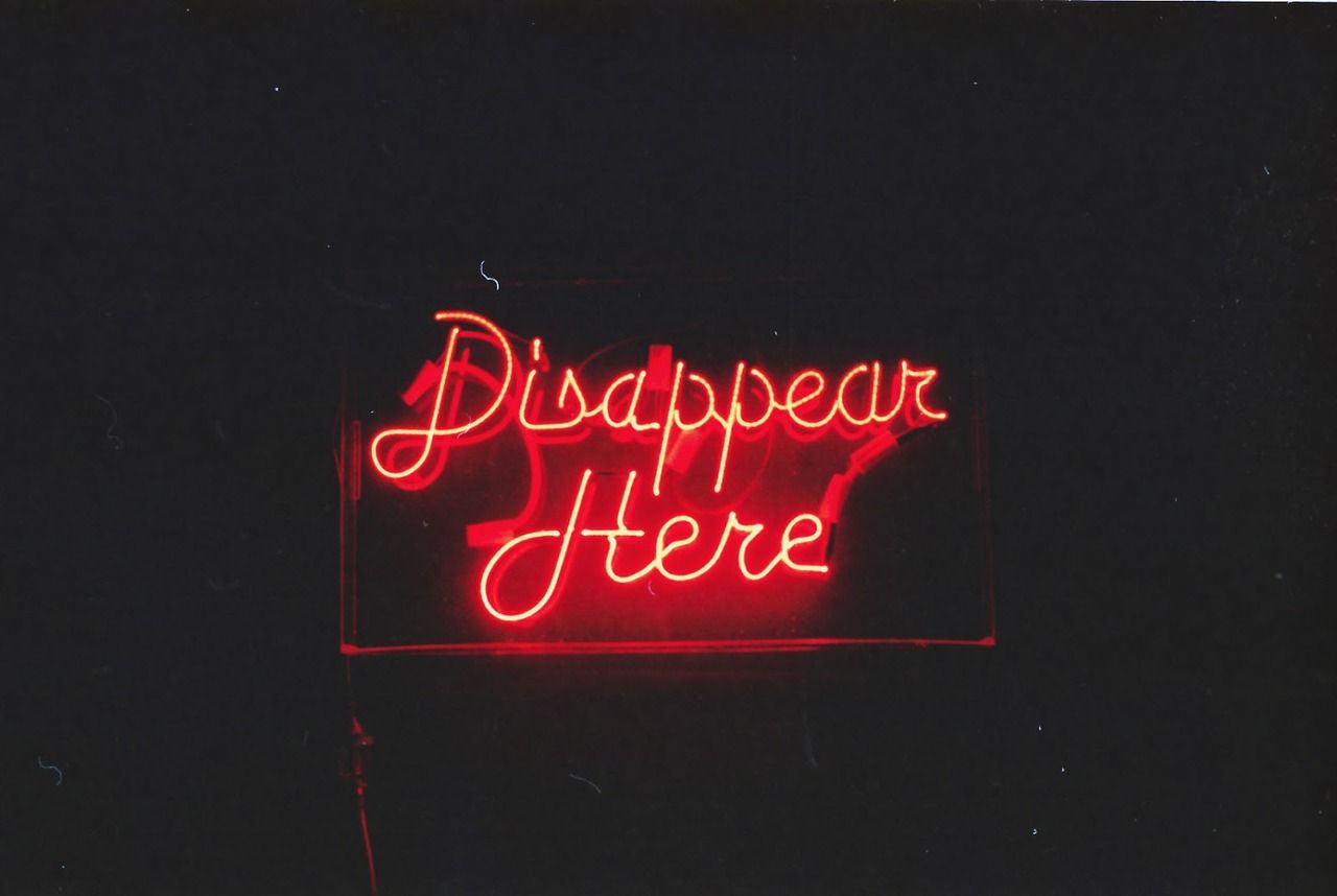 A red neon sign that says 