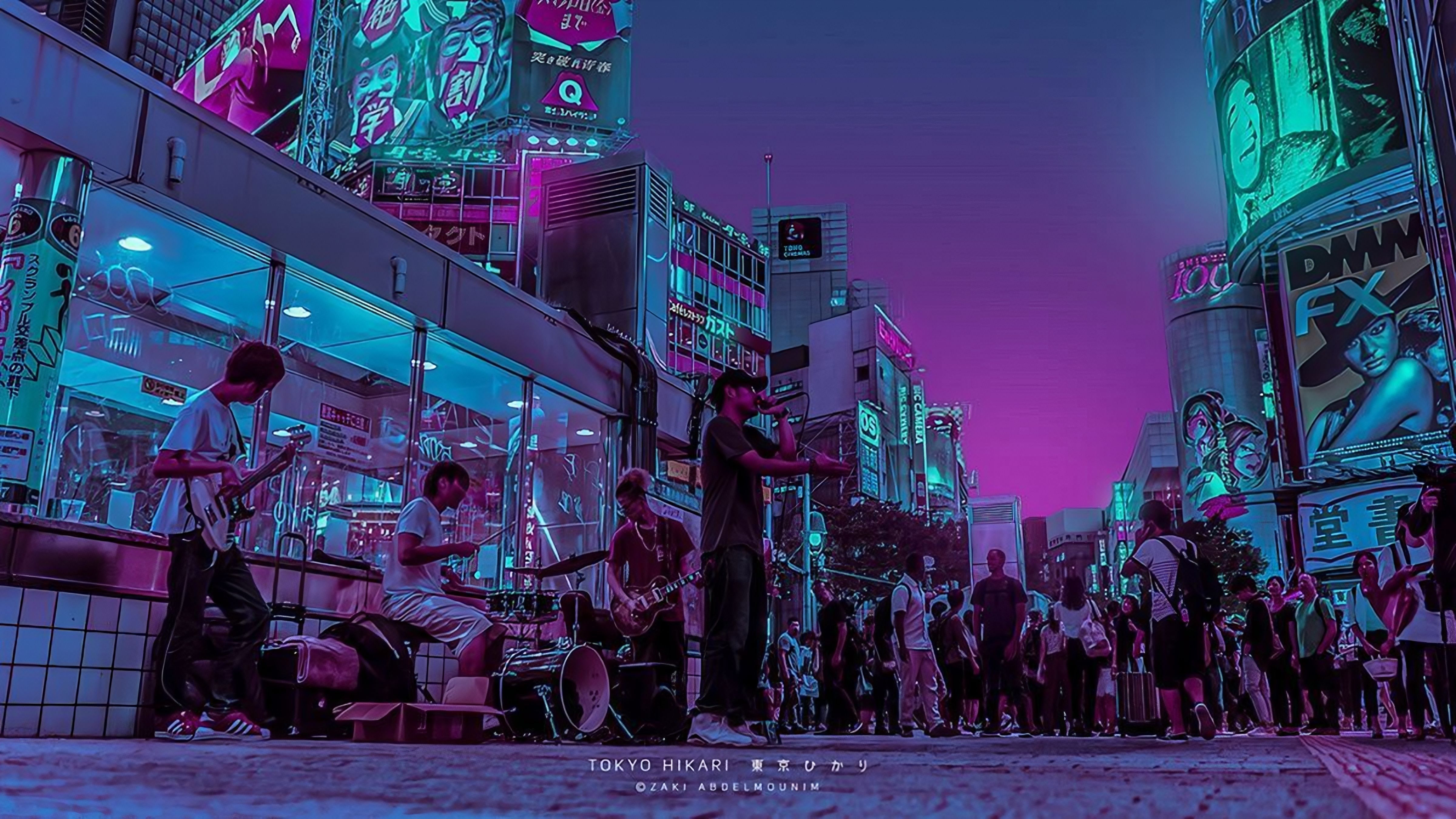 A group of people standing on the sidewalk - Tokyo