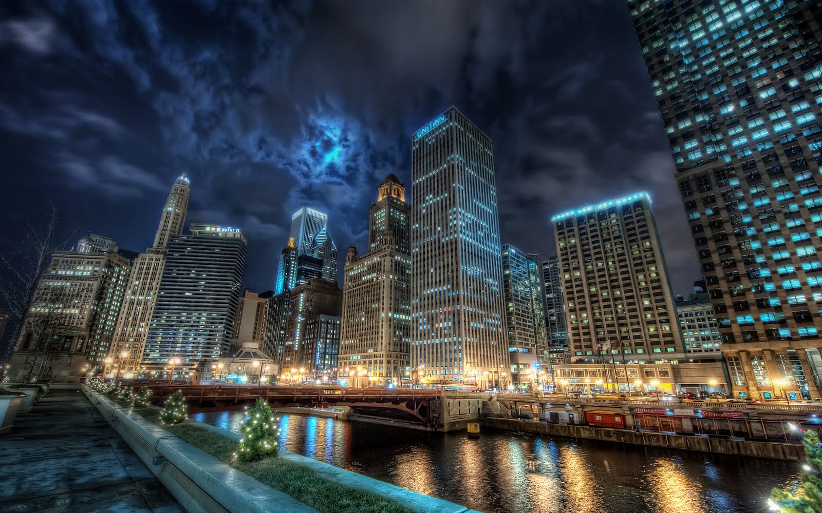 A cityscape at night with the river in the foreground - Chicago