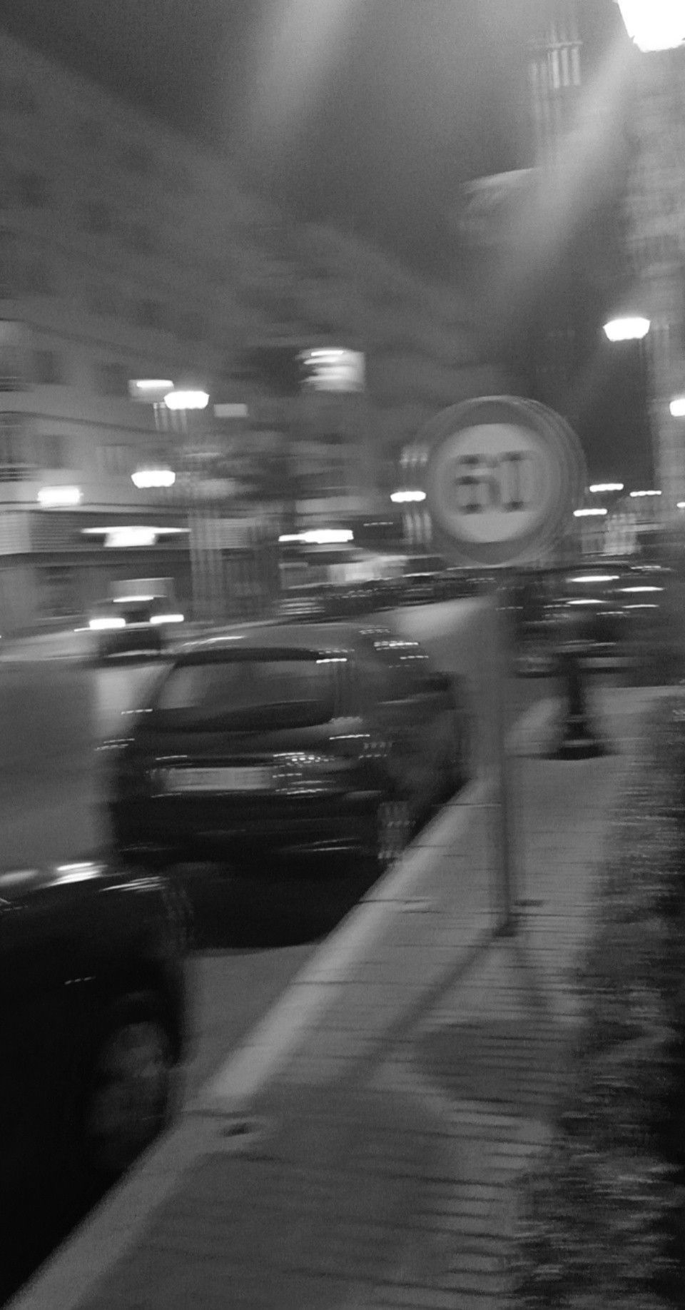 A blurry photo of cars on the street - Blurry