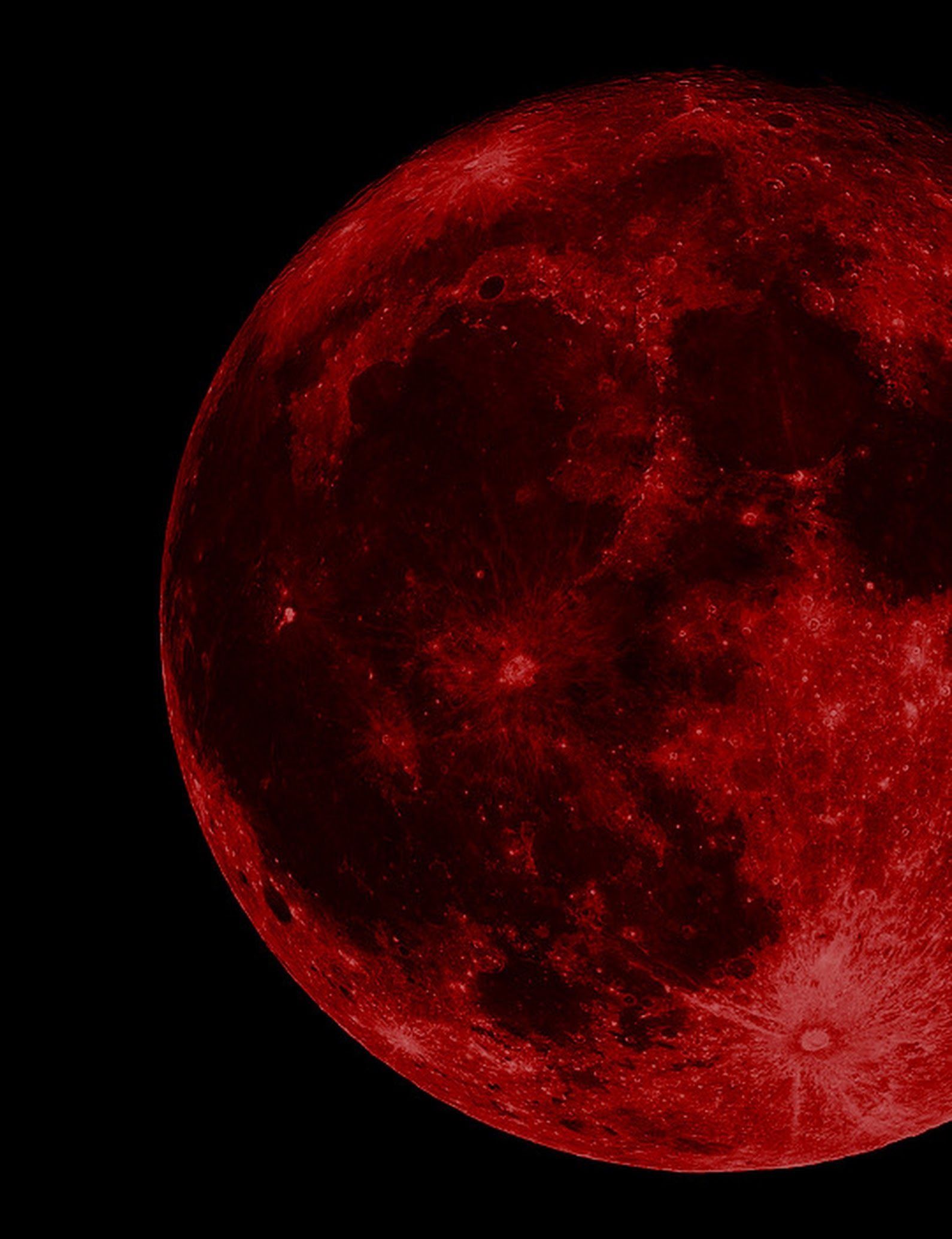 A red full moon against a black sky - Crimson