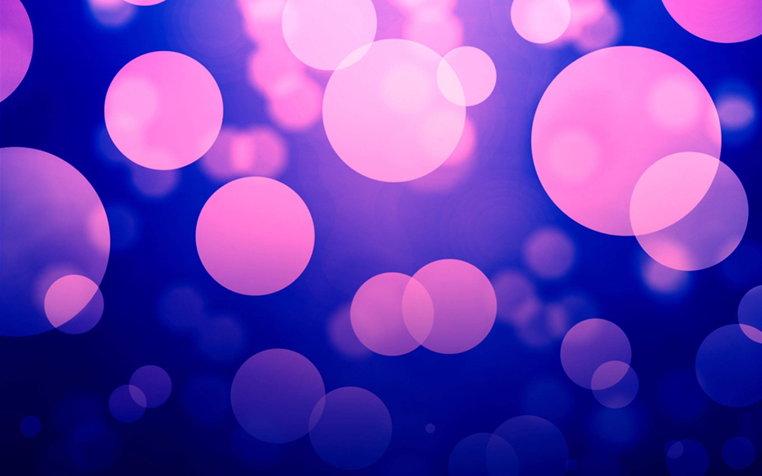 A pink and purple bokeh background with a dark blue background - Blurry, iPad