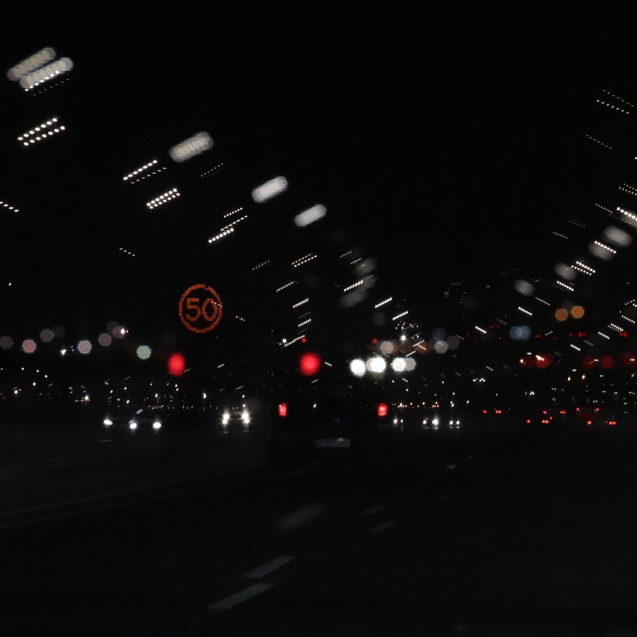 A blurry image of cars driving on the highway - Blurry