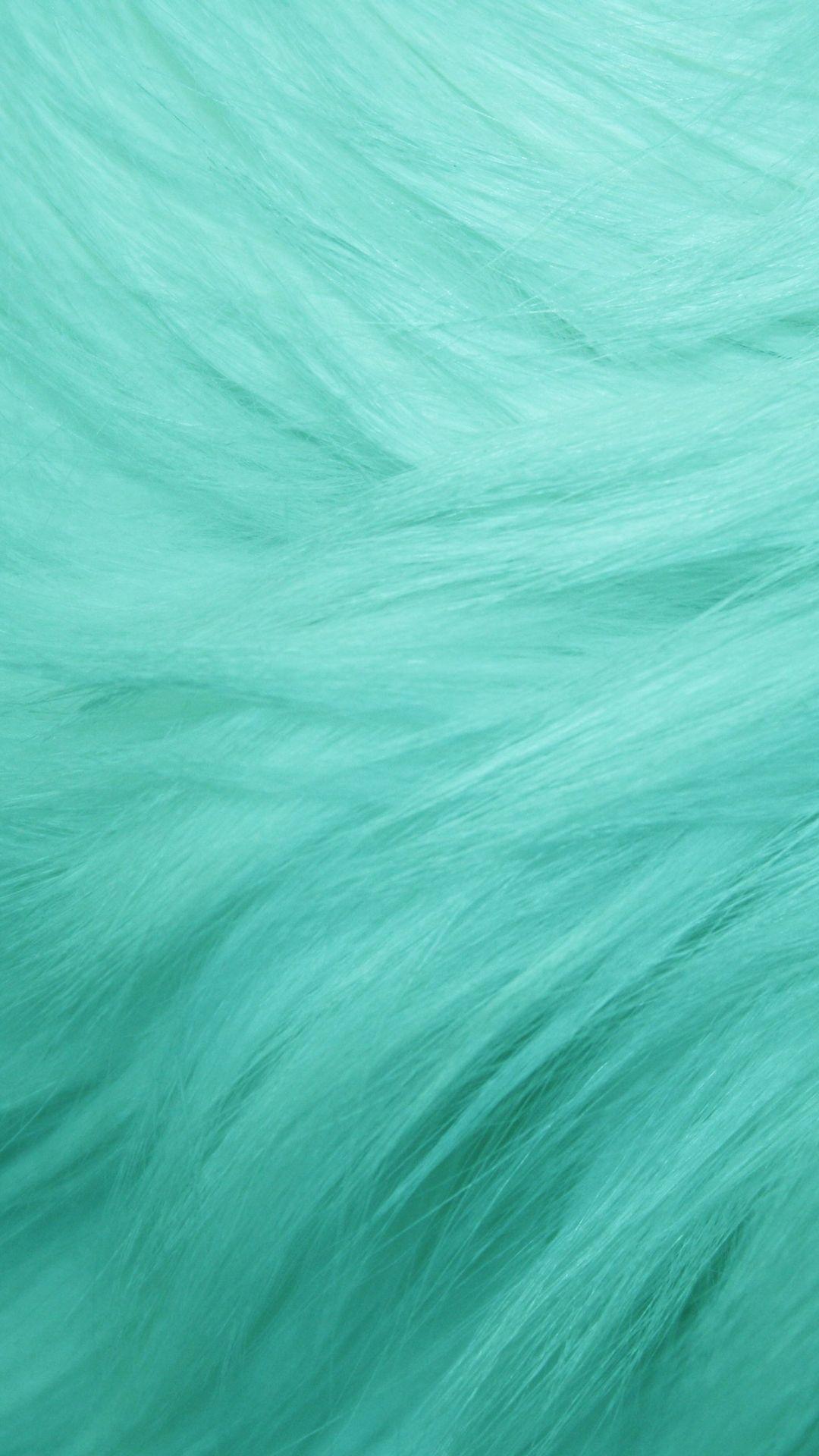 A close up of some green fur - Turquoise