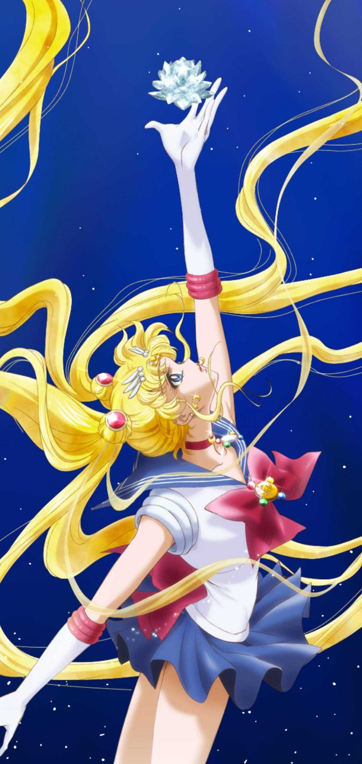 The sailor moon anime character is flying in front of a blue sky - Sailor Moon