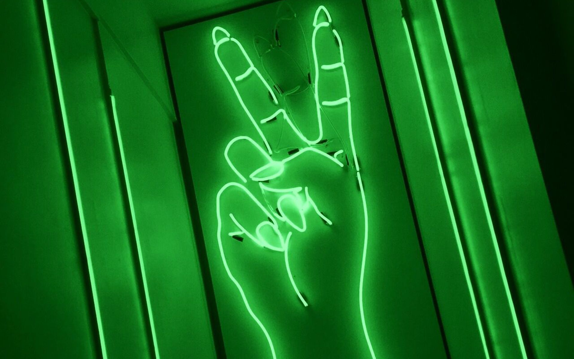 A neon green hand making the peace sign - Dark green, green, lime green