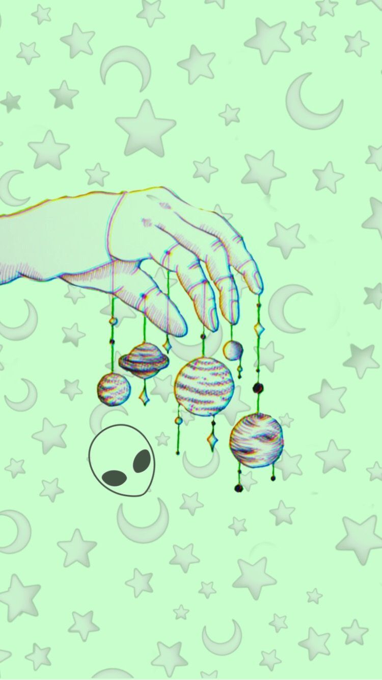 A hand holding planets and stars in the background - Green