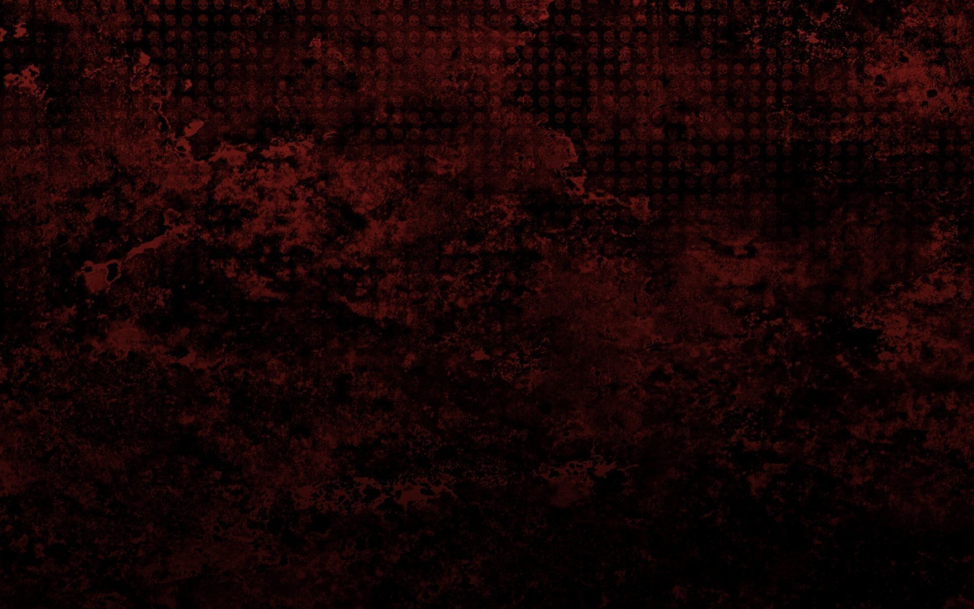 Skull pattern on a red grunge Wallpaper 28537