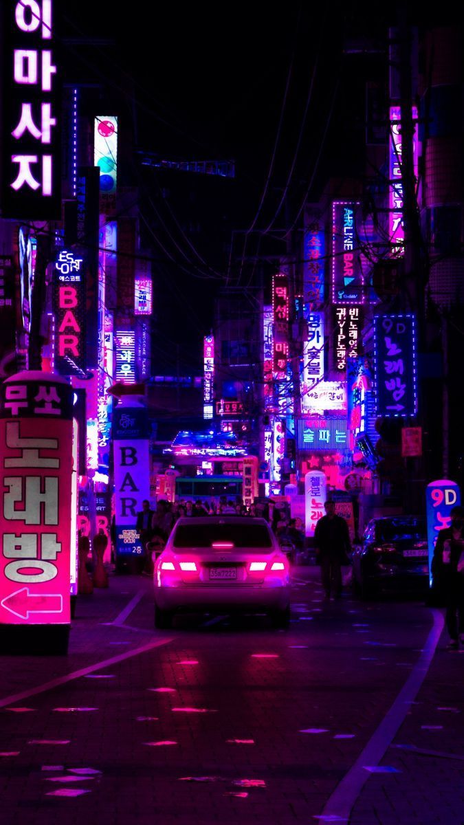 A city street with neon lights and cars - Cyberpunk