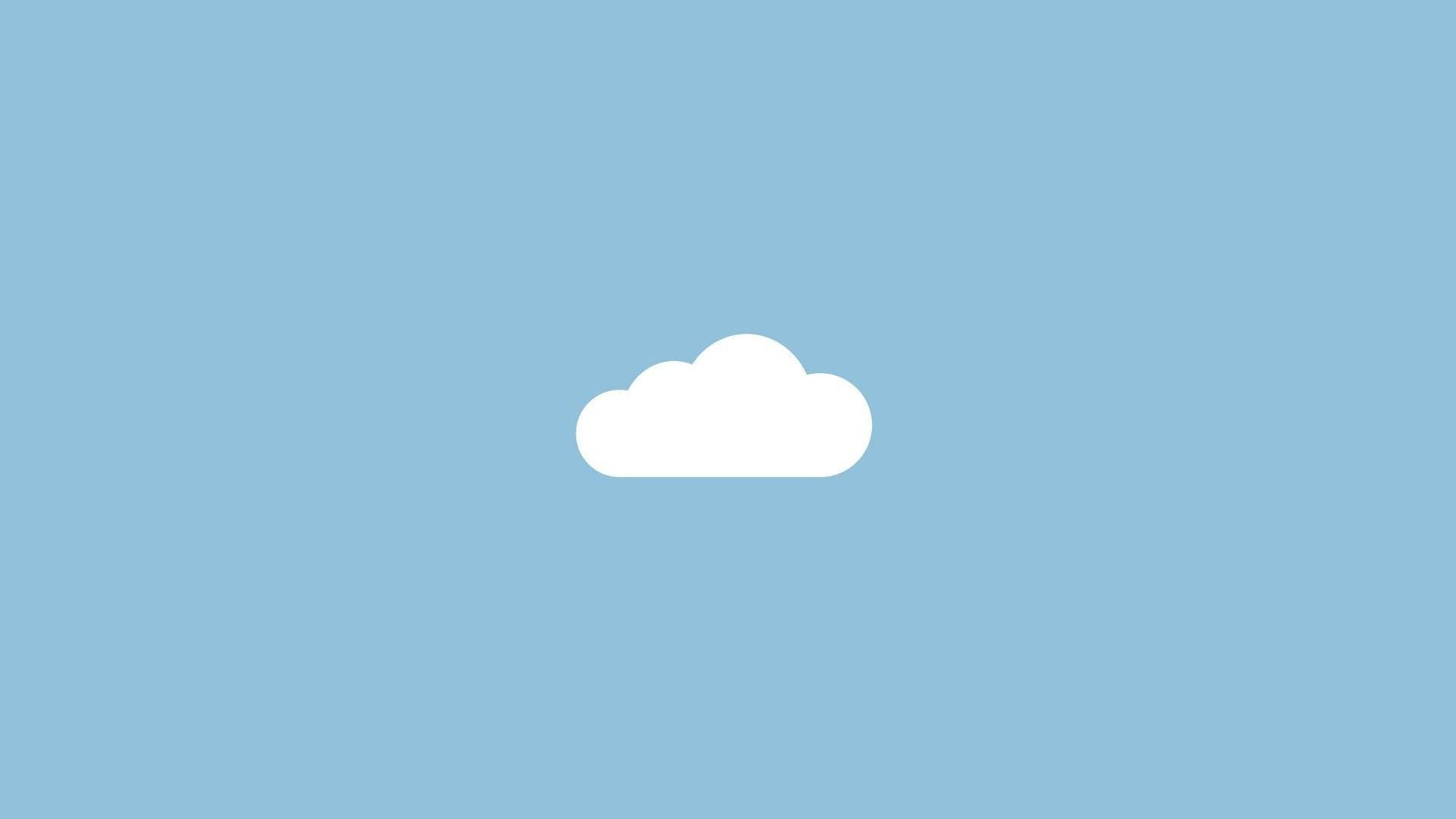 A white cloud on top of blue sky - Pastel blue