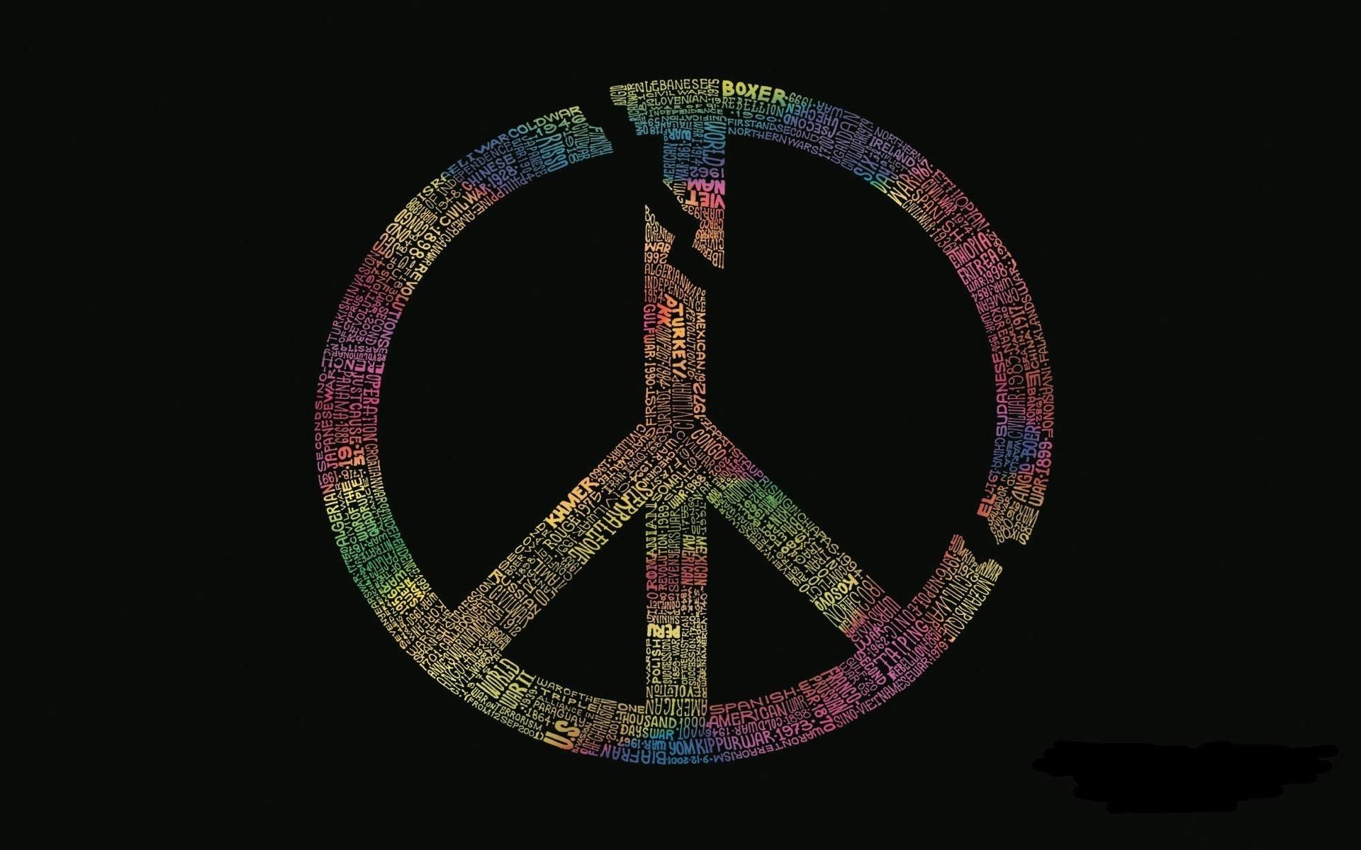 A peace sign made of different colored paint - Peace