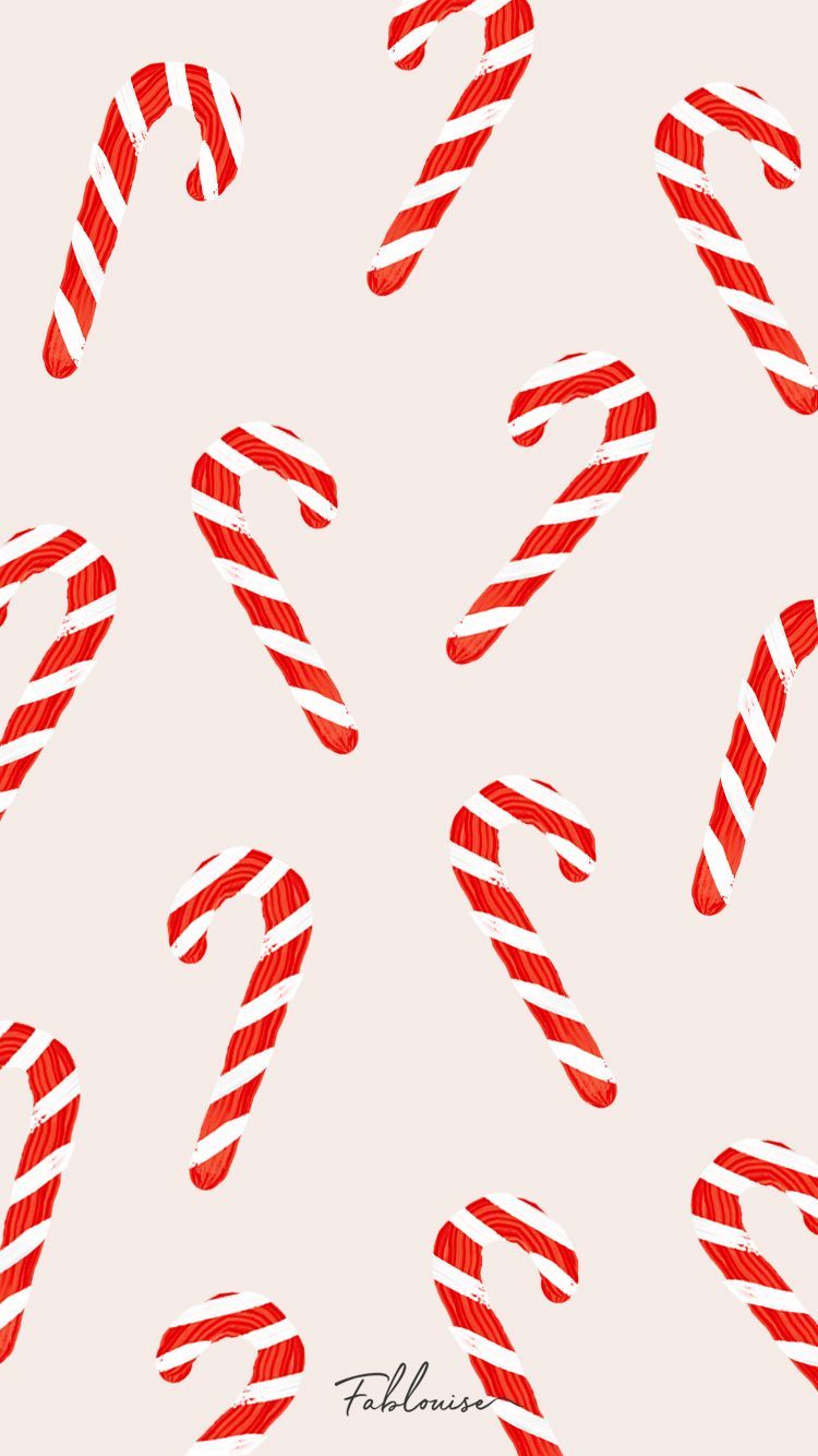 A pattern of candy canes on white - Candy cane