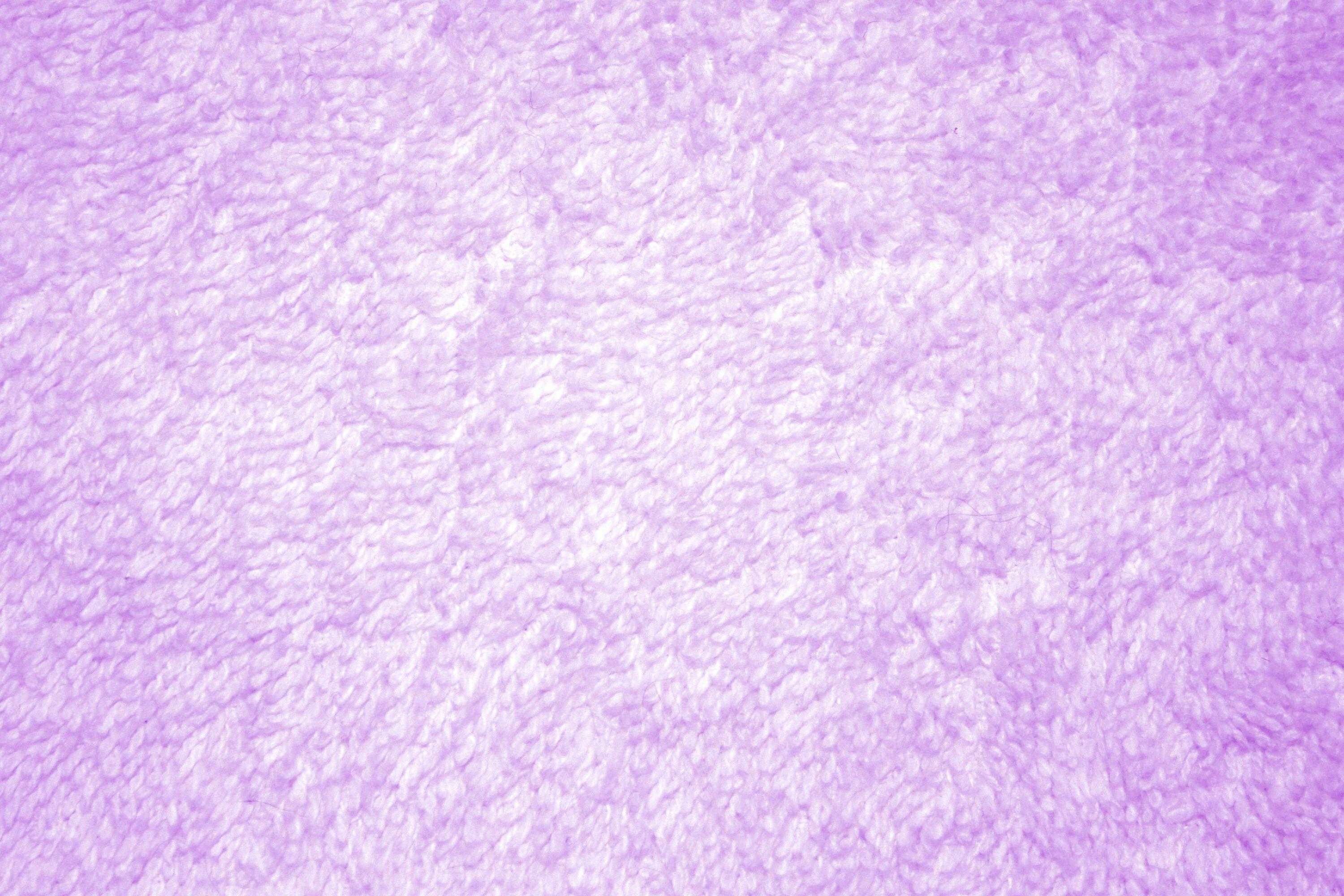 A purple towel texture background - Light purple