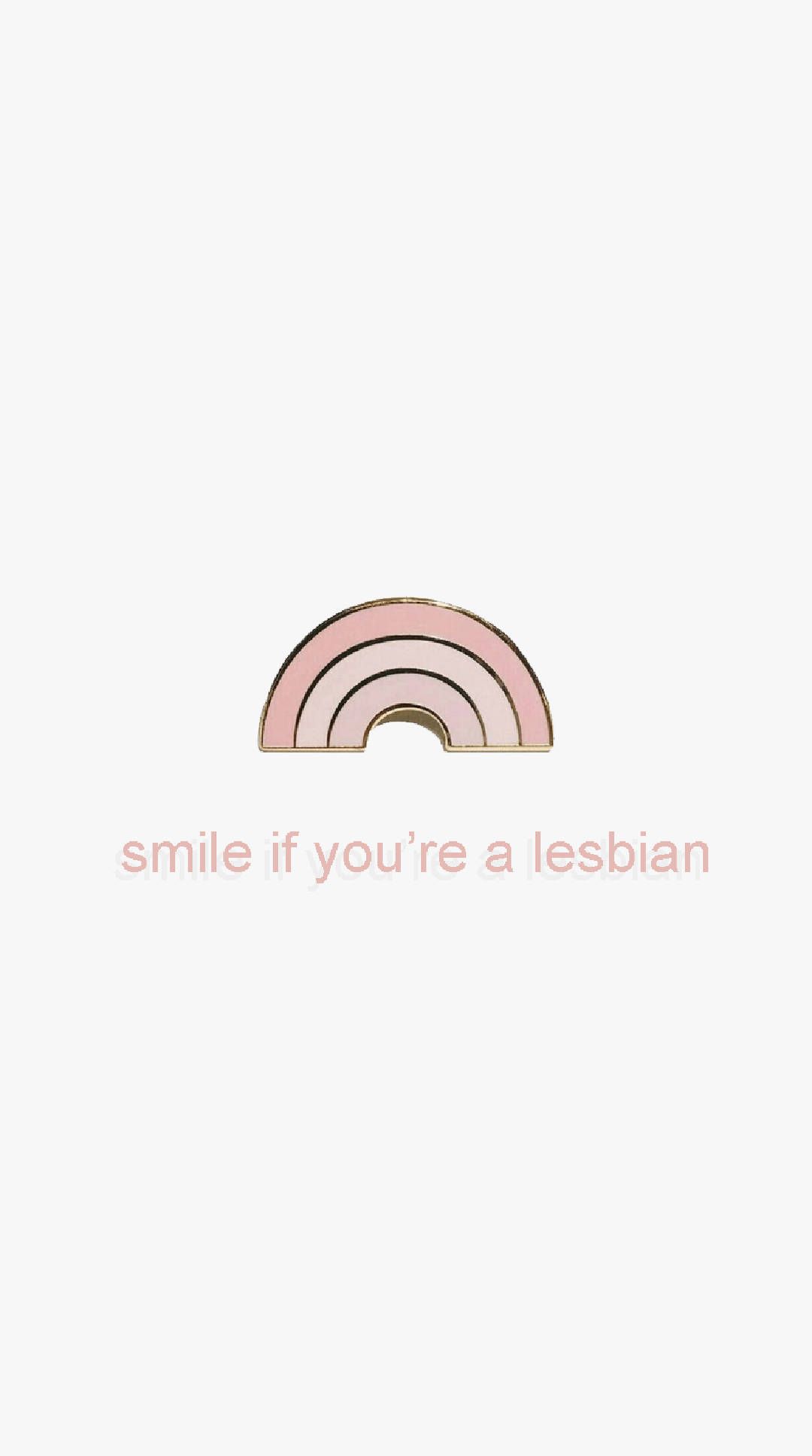 A rainbow pin with the words smile if you're lesbian - Lesbian