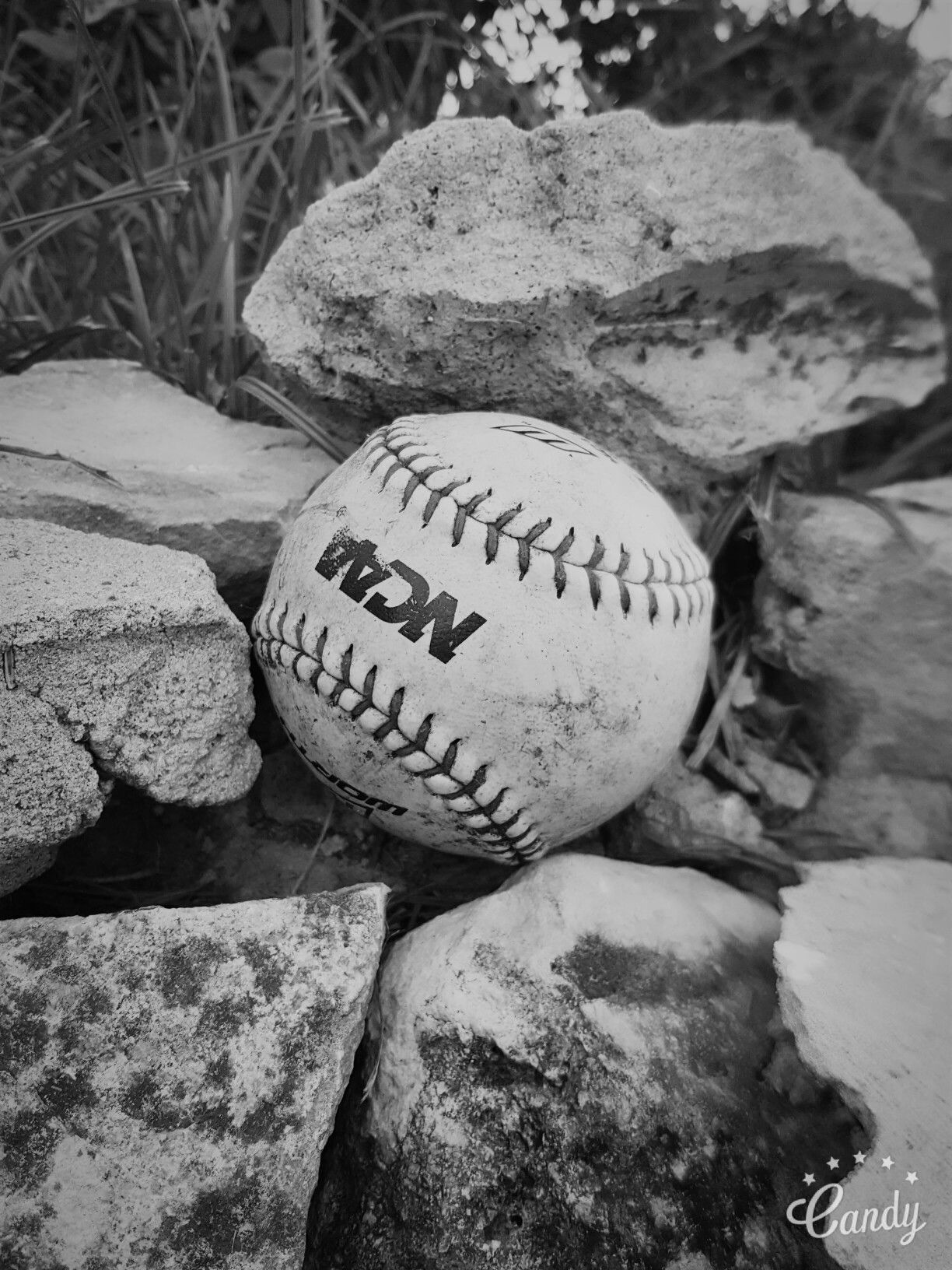 A baseball in the rocks - Softball