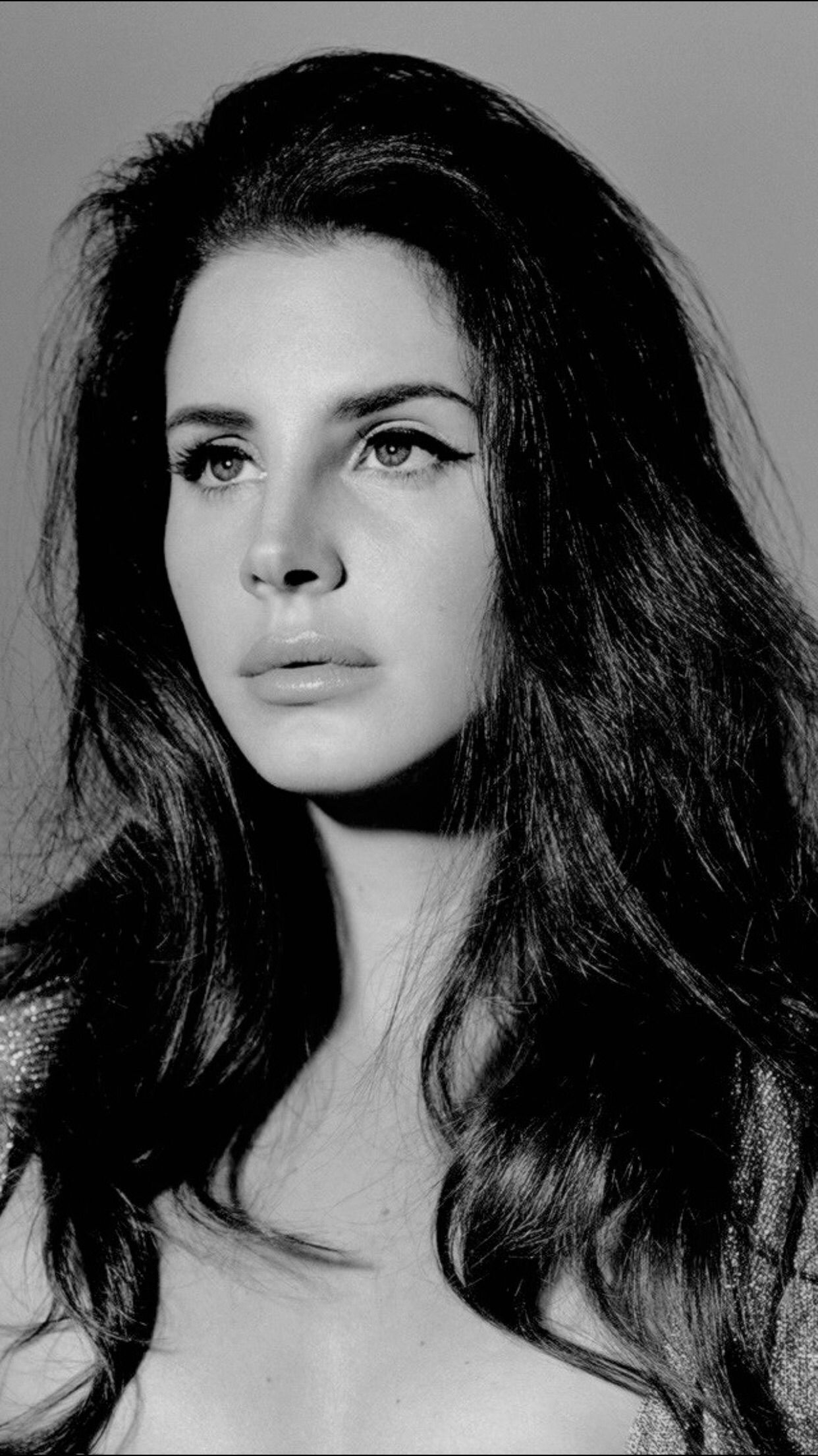 A woman with long hair and black & white photo - Lana Del Rey