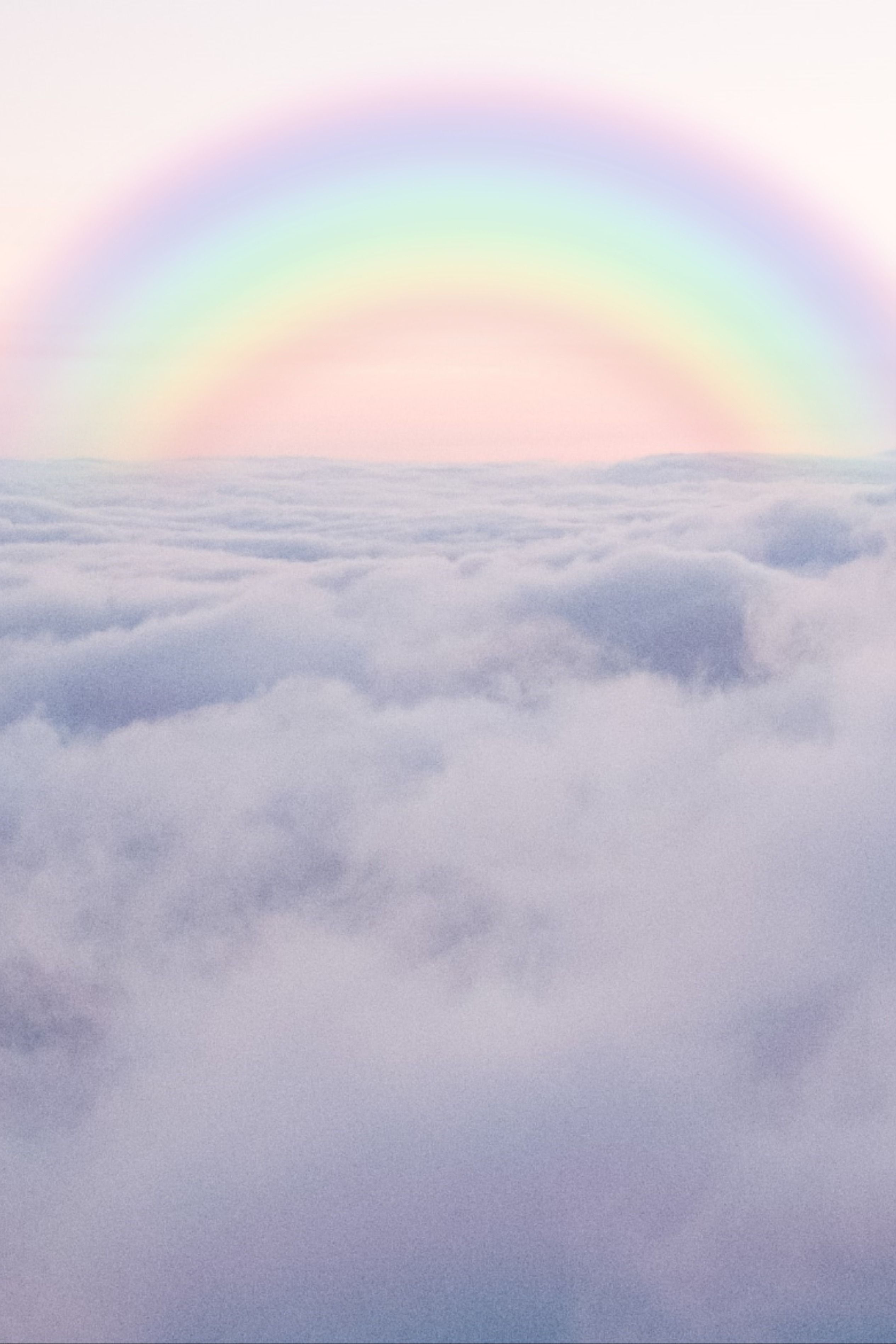 A rainbow is seen in the sky - Pastel rainbow, rainbows