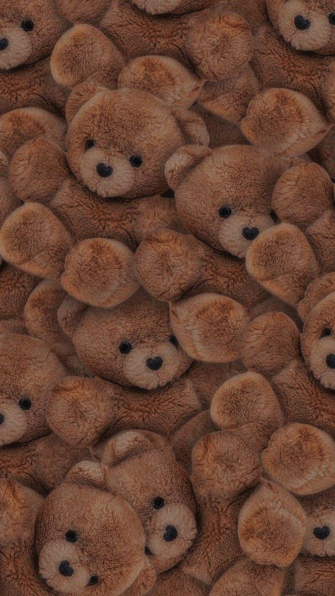 A close up of many brown teddy bears - Teddy bear