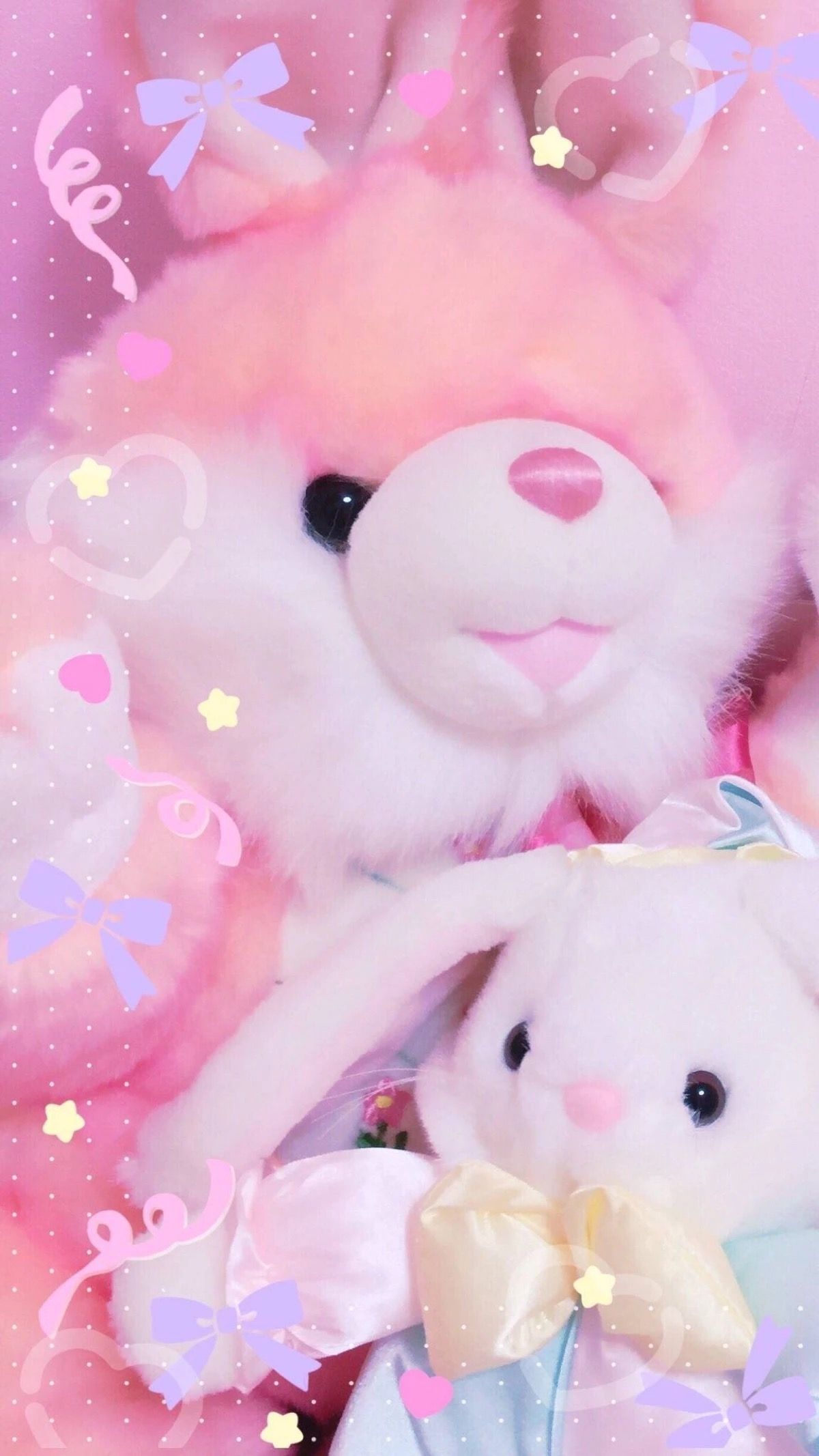 Two cute rabbit plushies on a pink background - Teddy bear