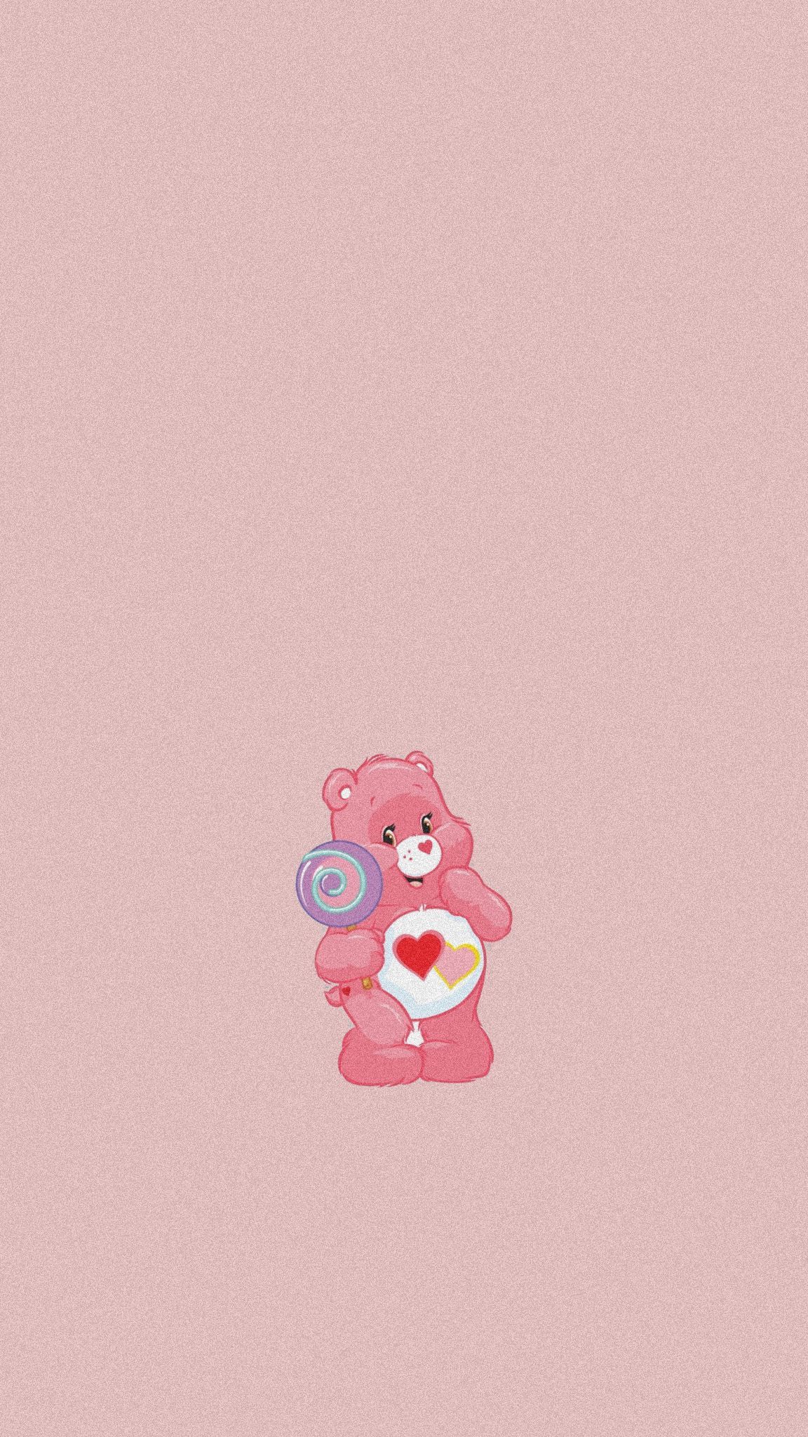 A pink teddy bear holding an ice cream cone - Teddy bear