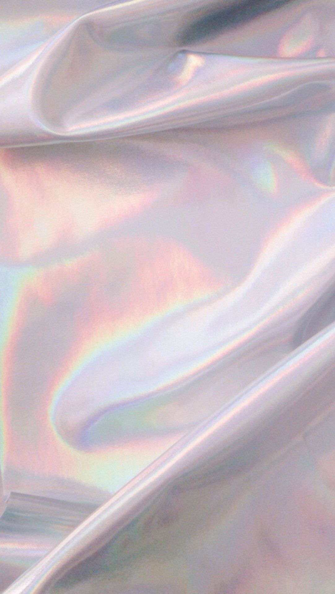 A close up of some fabric with rainbow colors - Rose gold