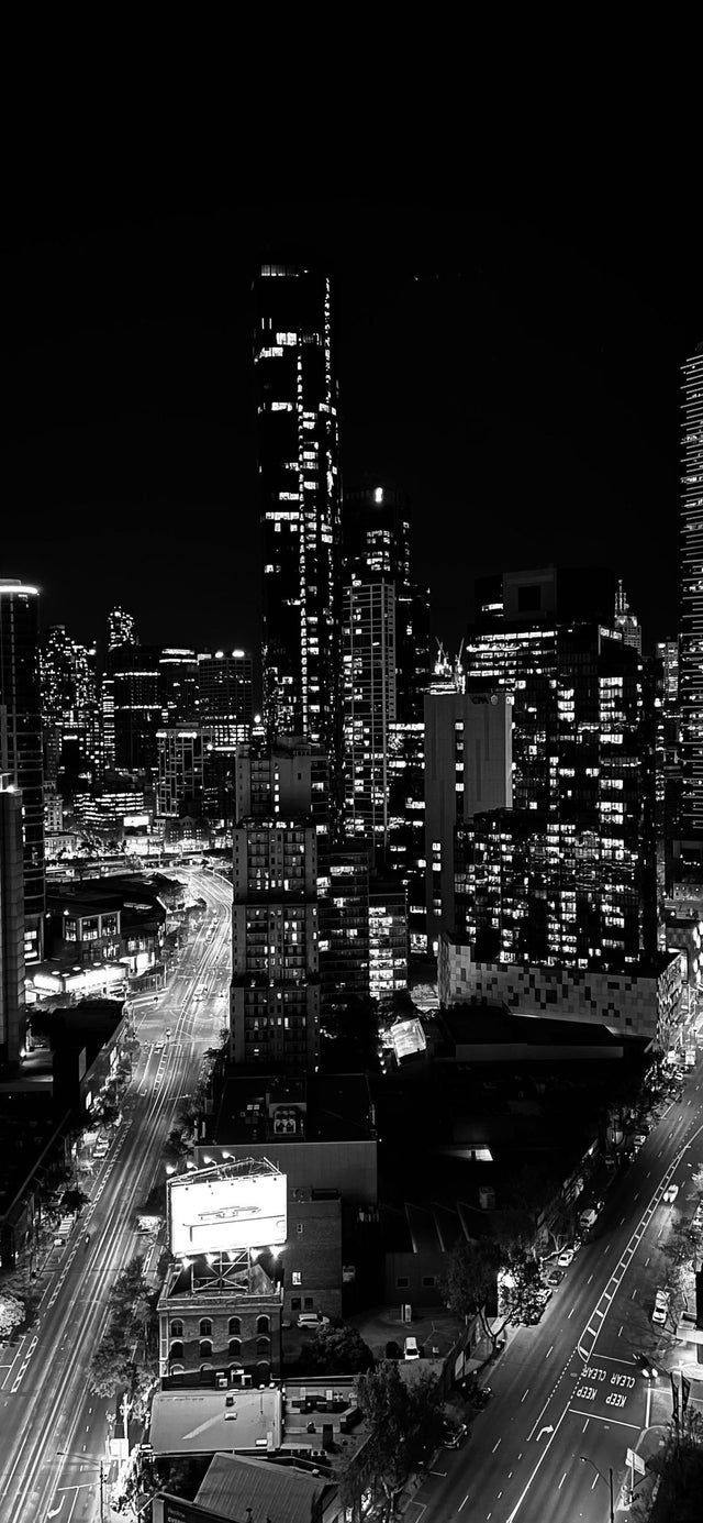 A black and white photo of an urban city - City