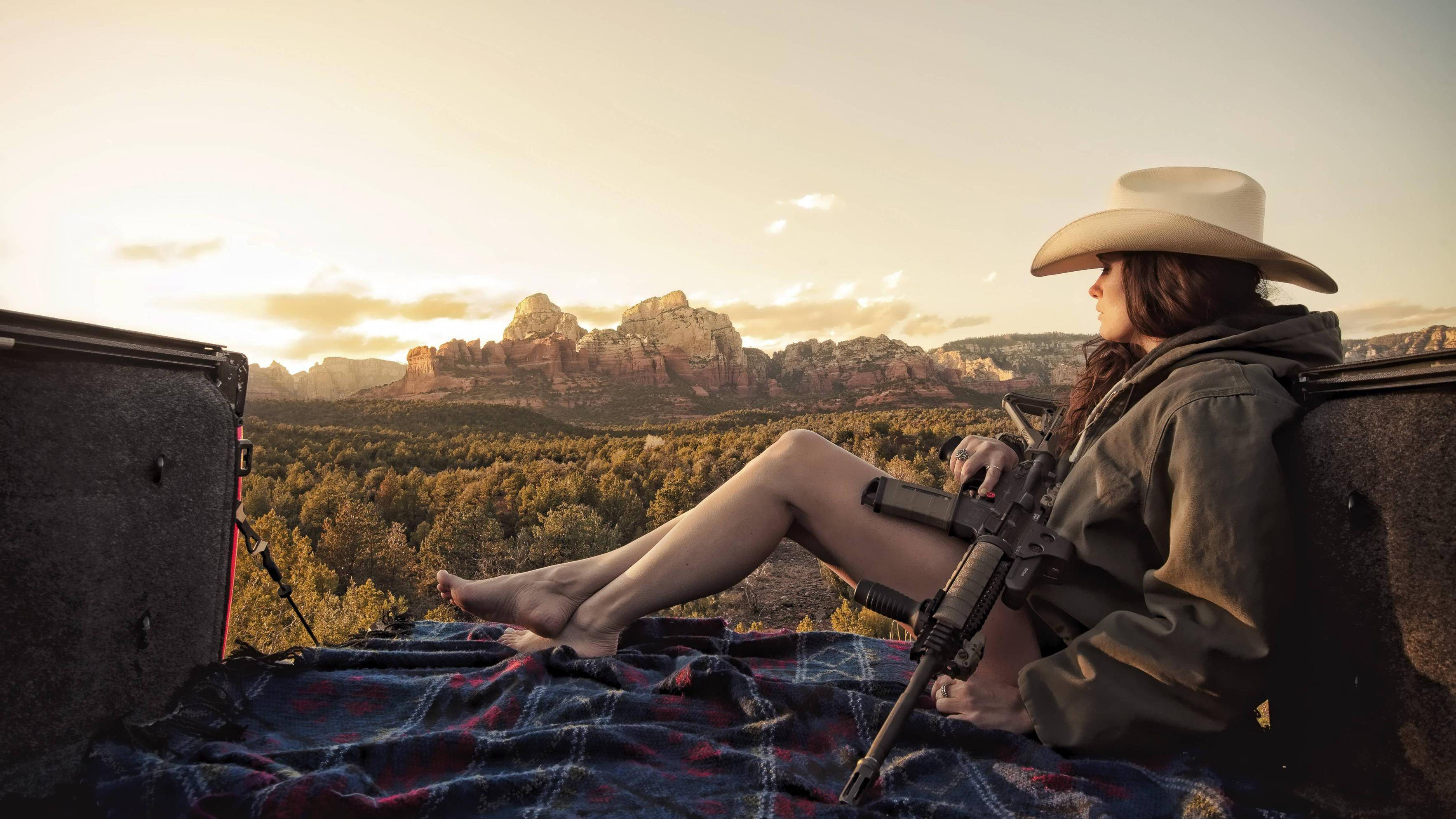 Download Country Western Cowgirl Gun Resting Wallpaper