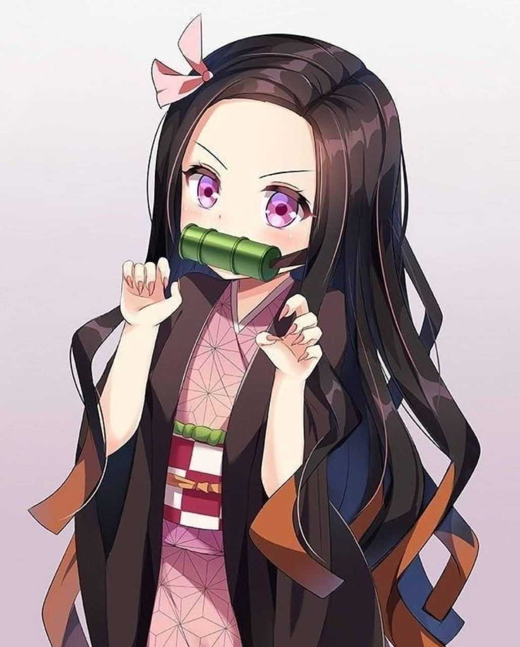 Anime girl with long hair and green eyes - Nezuko