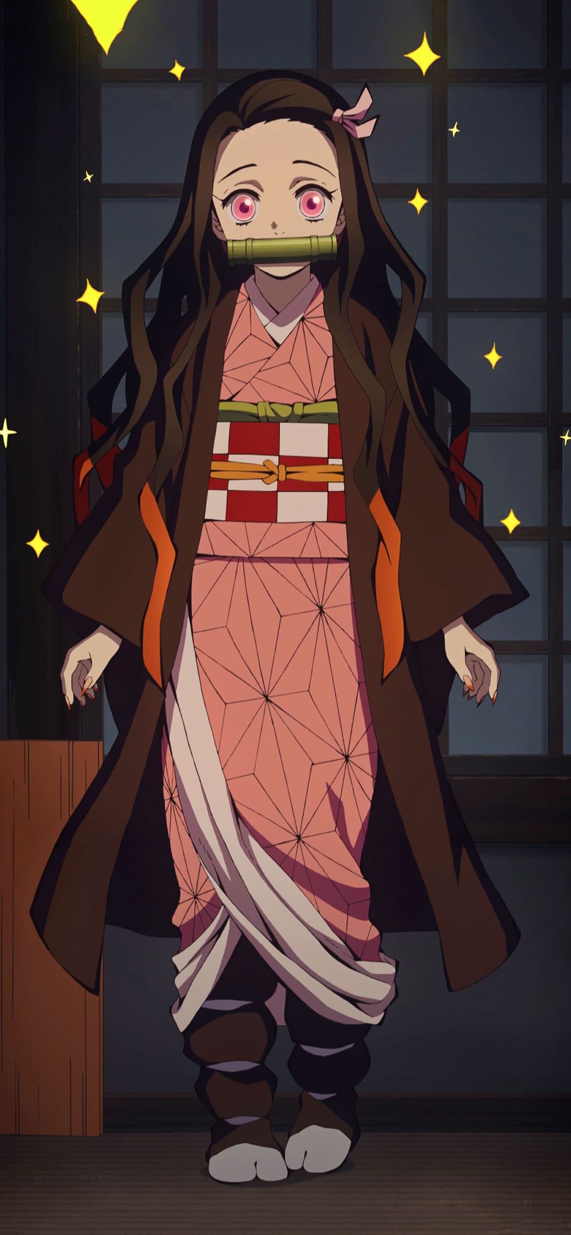 A cartoon character with long hair and an outfit - Nezuko