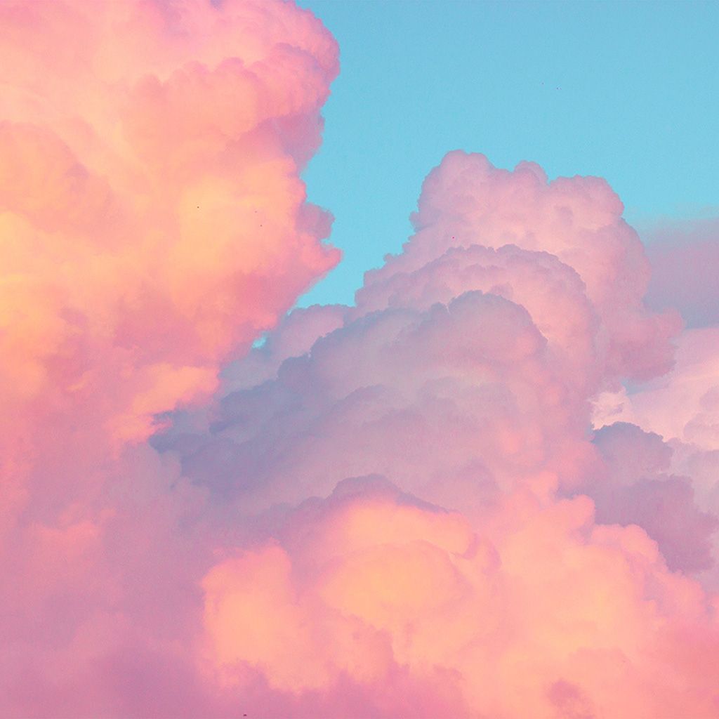 A photo of a blue sky with pink clouds - Cloud