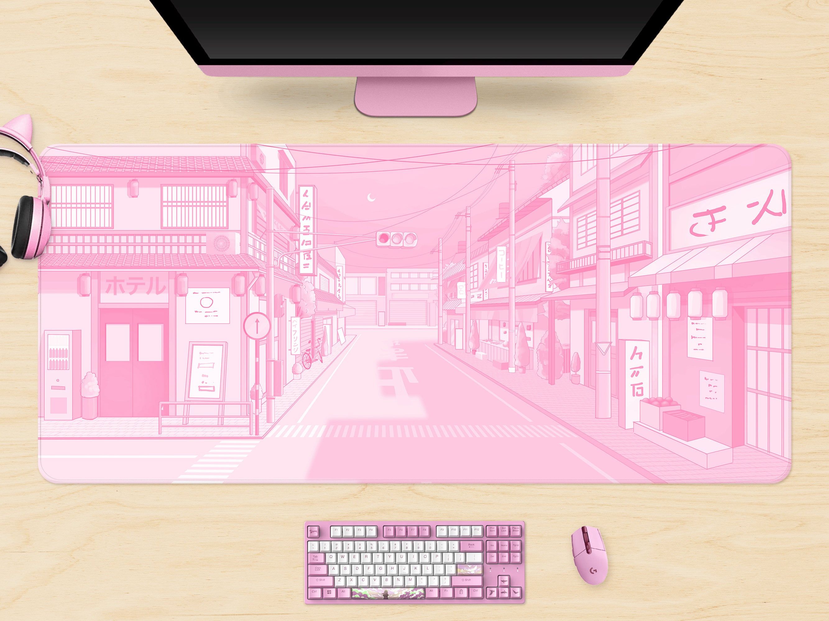 A computer monitor and keyboard on top of an office desk - Pink anime