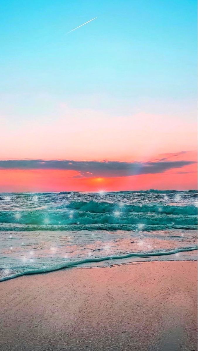 A beach with a blue and pink sunset - Sunset, ocean