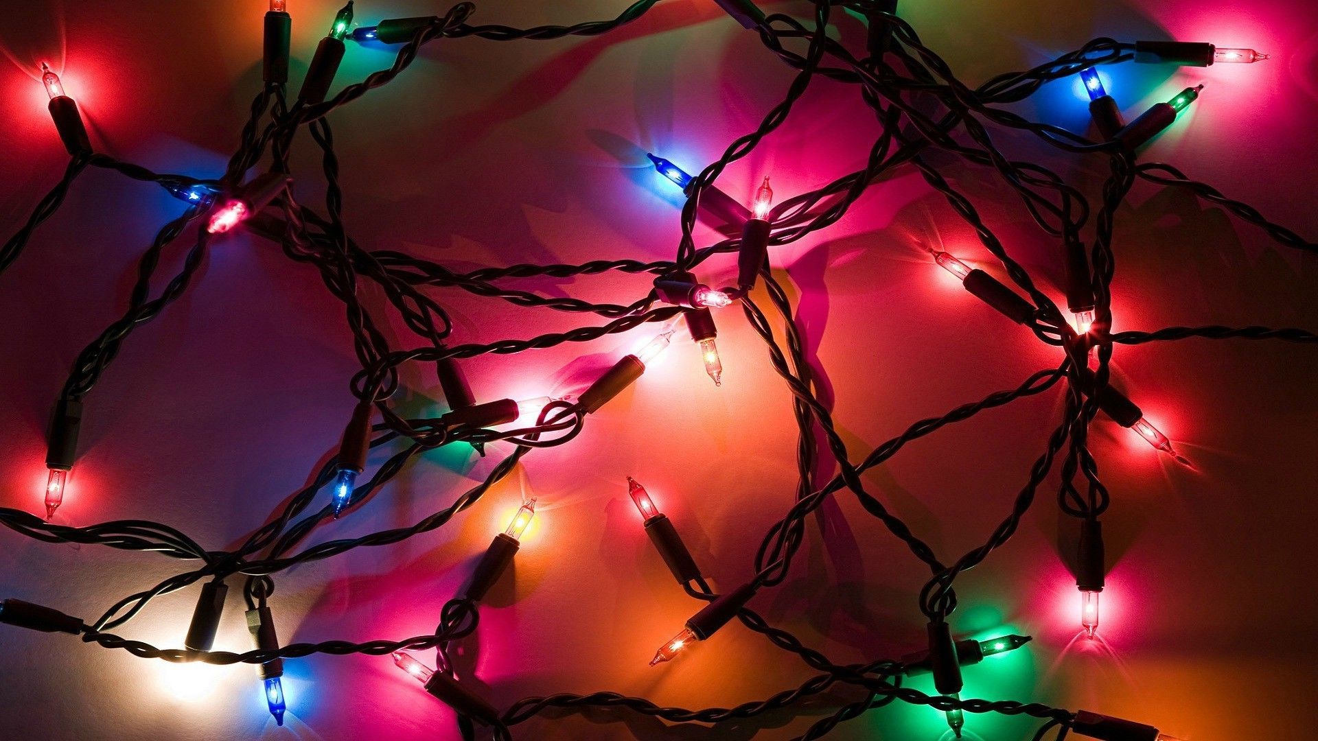 A close up of some colorful christmas lights - Christmas lights