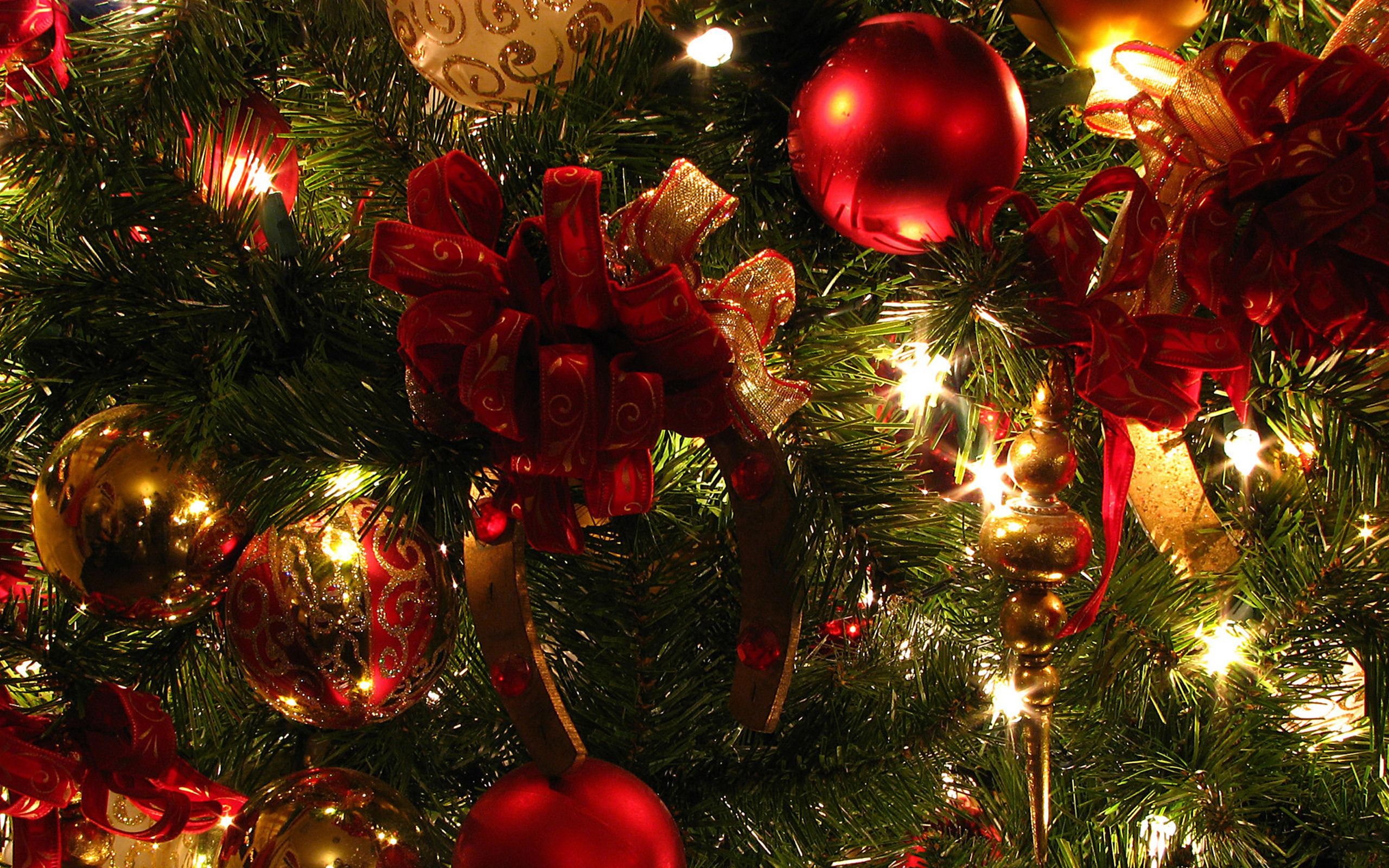 A christmas tree with ornaments and lights - Christmas lights