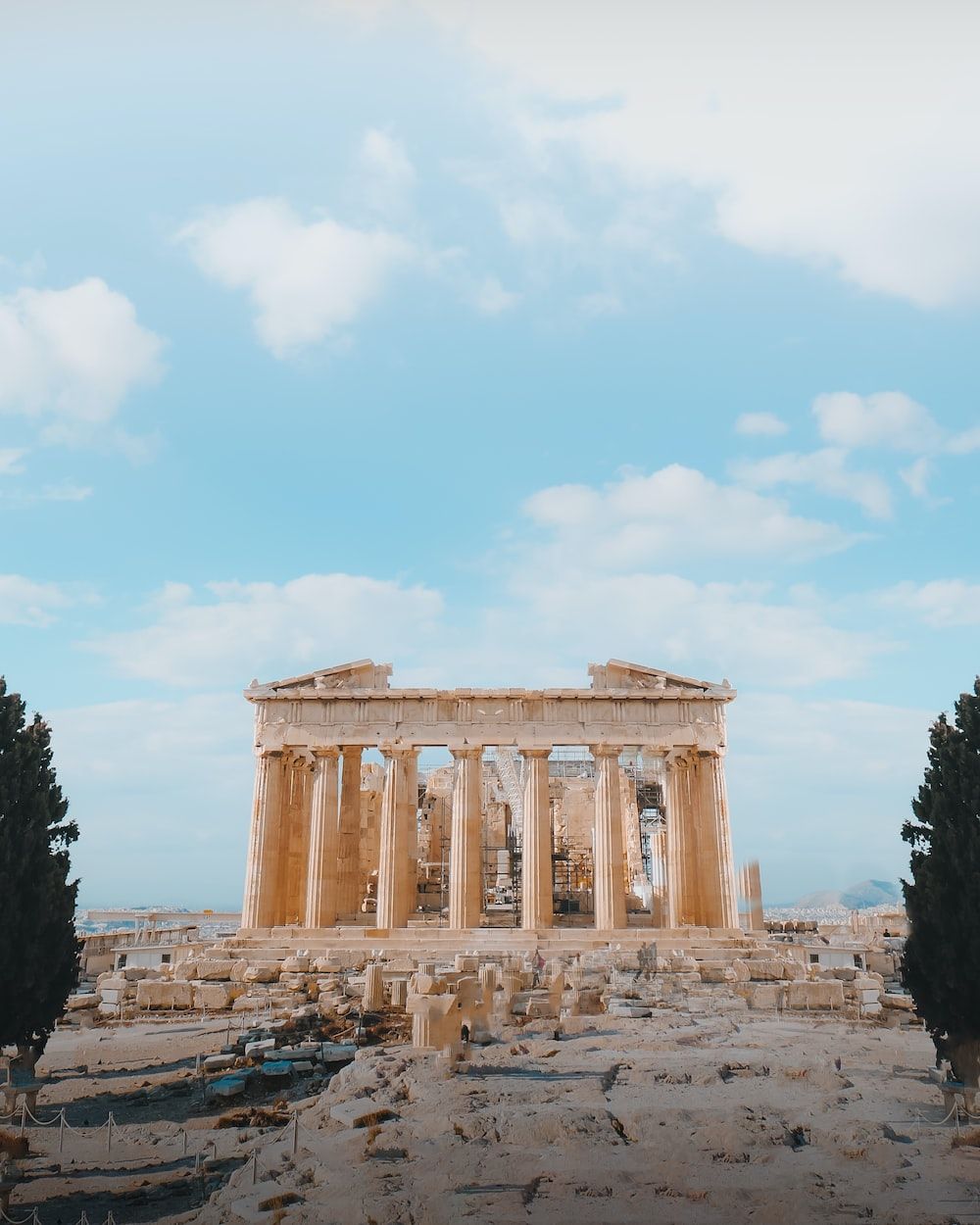 A picture of an old building with trees - Greek mythology