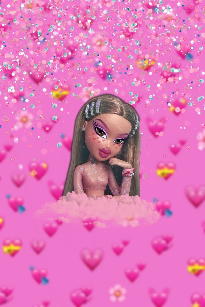 A Bratz doll sitting in a pile of pink fluffy stuff with hearts and sparkles around her - Bratz