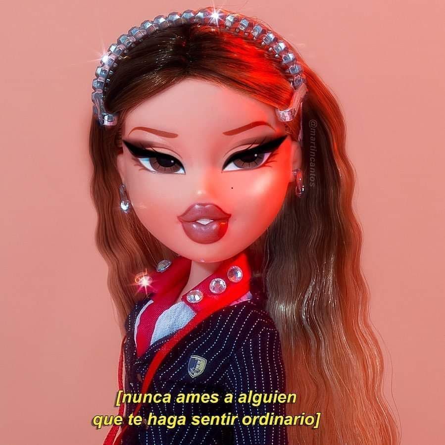 A doll with long hair and a red lip - Bratz