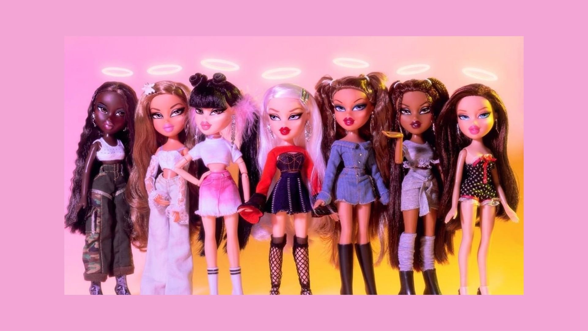 A line of Bratz dolls with different skin tones, hair colors, and outfits. - Bratz