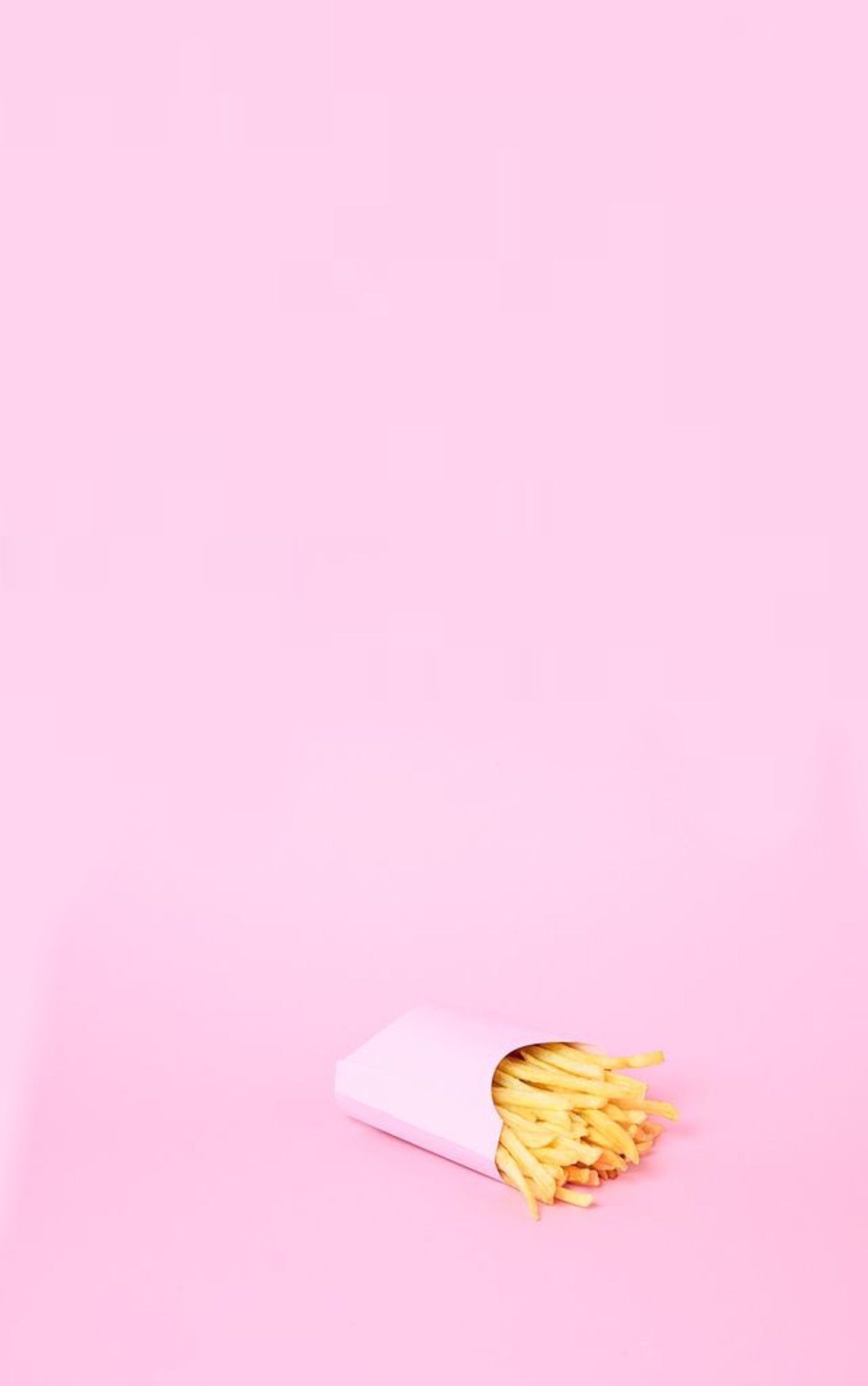 A pink paper bag of french fries on a pink background - Light pink, soft pink