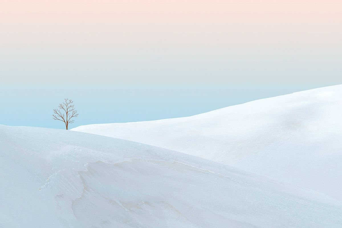 A person is skiing down the side of snowy mountain - Winter