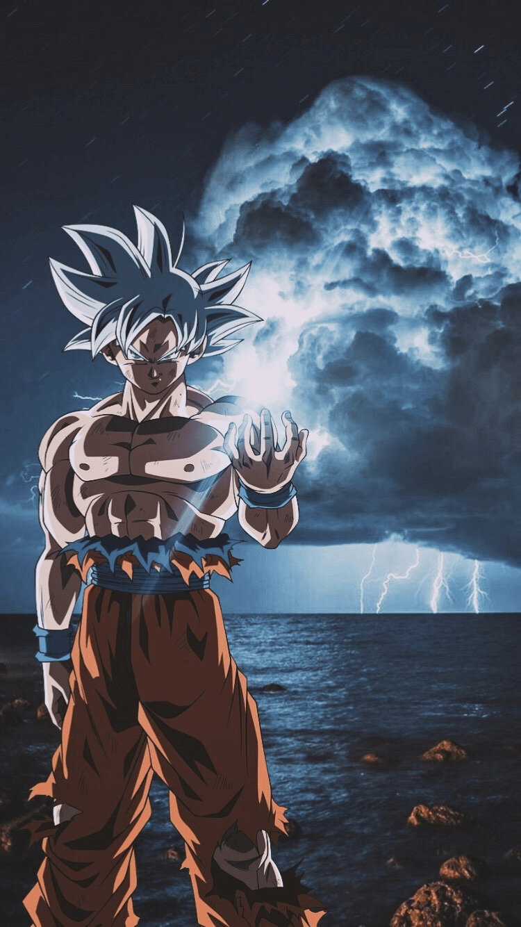 Aesthetic wallpaper of Goku standing on a beach with lightning in the background - Goku