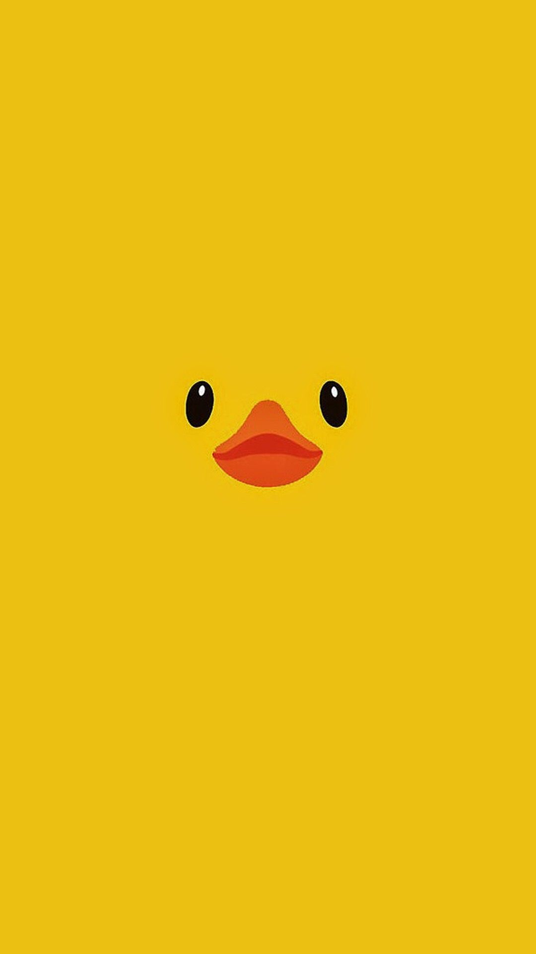 A yellow duck with black eyes and orange beak - Duck