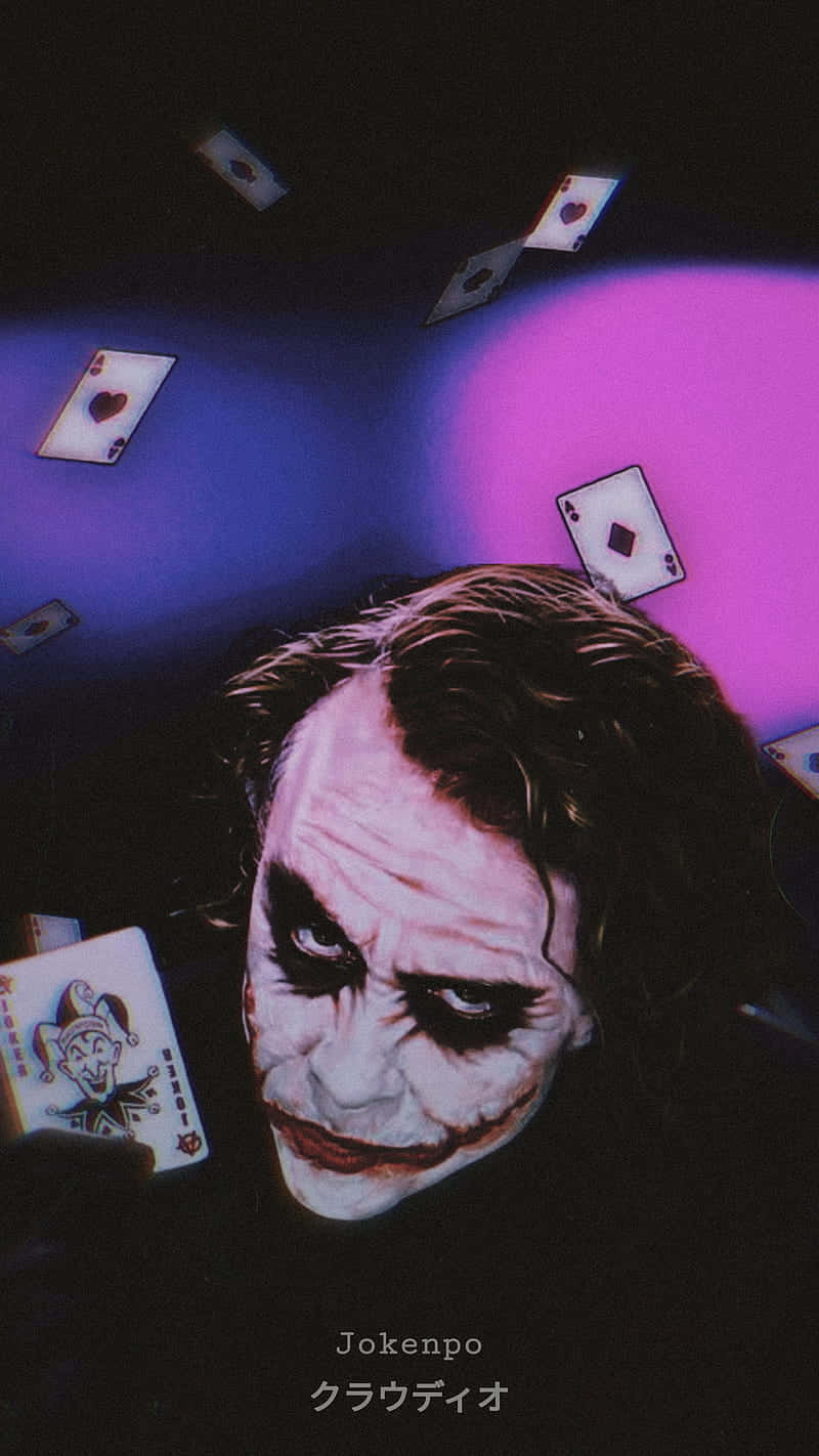 A poster of the joker with playing cards - Clown