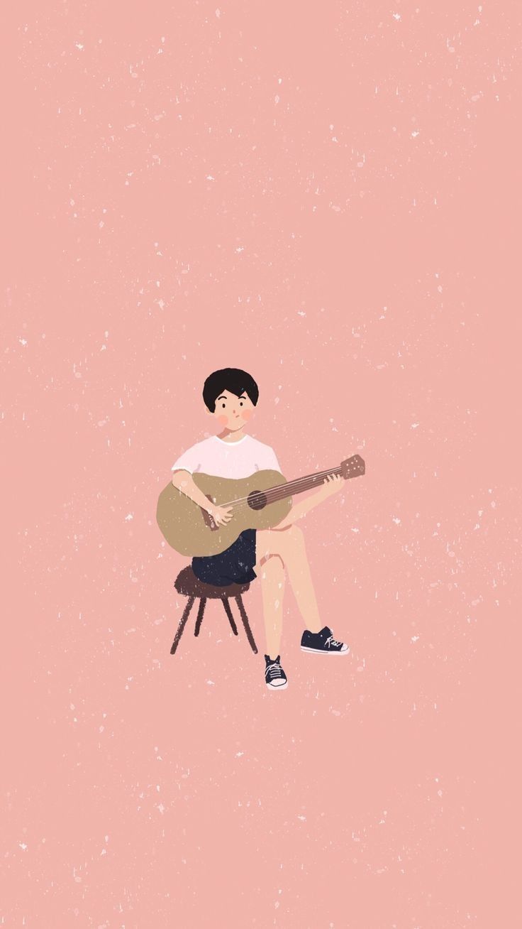 A person sitting on the ground playing guitar - Guitar