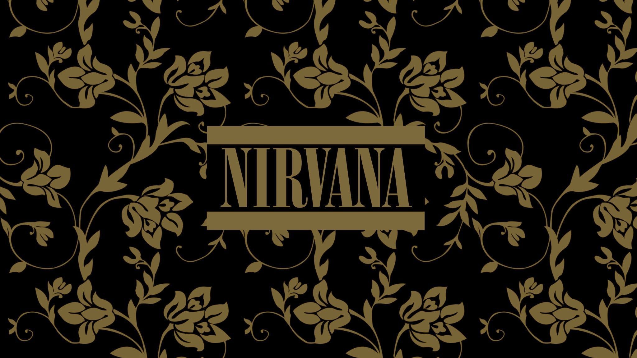 Nirvana wallpaper with black background and gold flowers. - Nirvana