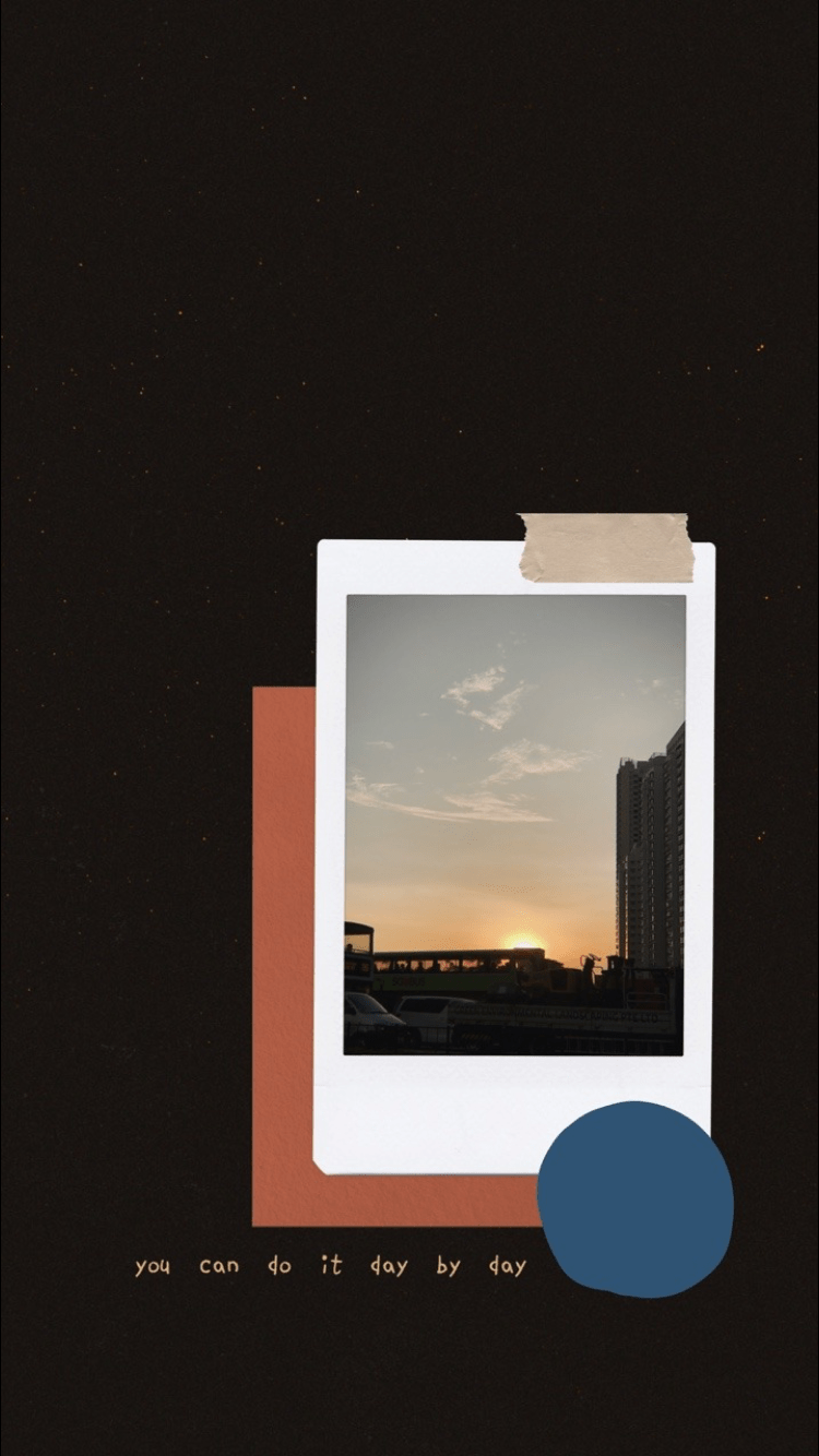A polaroid picture of a sunset with the words 