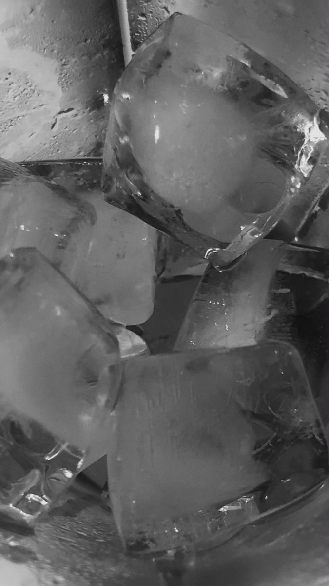 Black and white photo of ice cubes in a glass - Ice