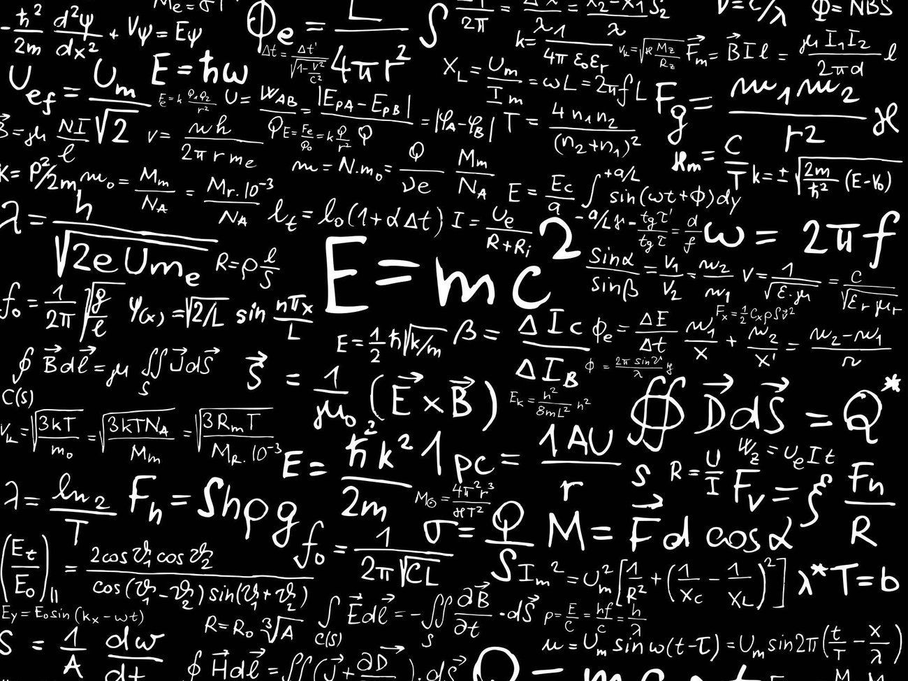 A blackboard covered in equations - Math