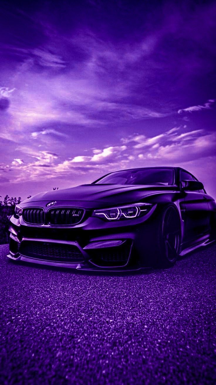 A purple car is parked on the road - BMW